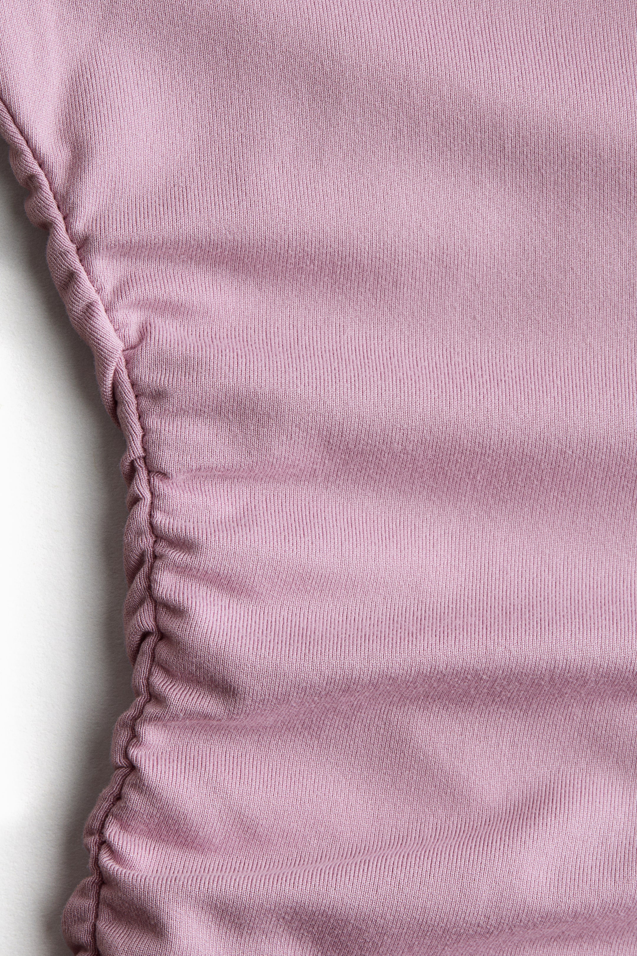 Ampliar la imagen: Sports top with SoftMove™ - Rosa tenue - Kids | H&M MX 5