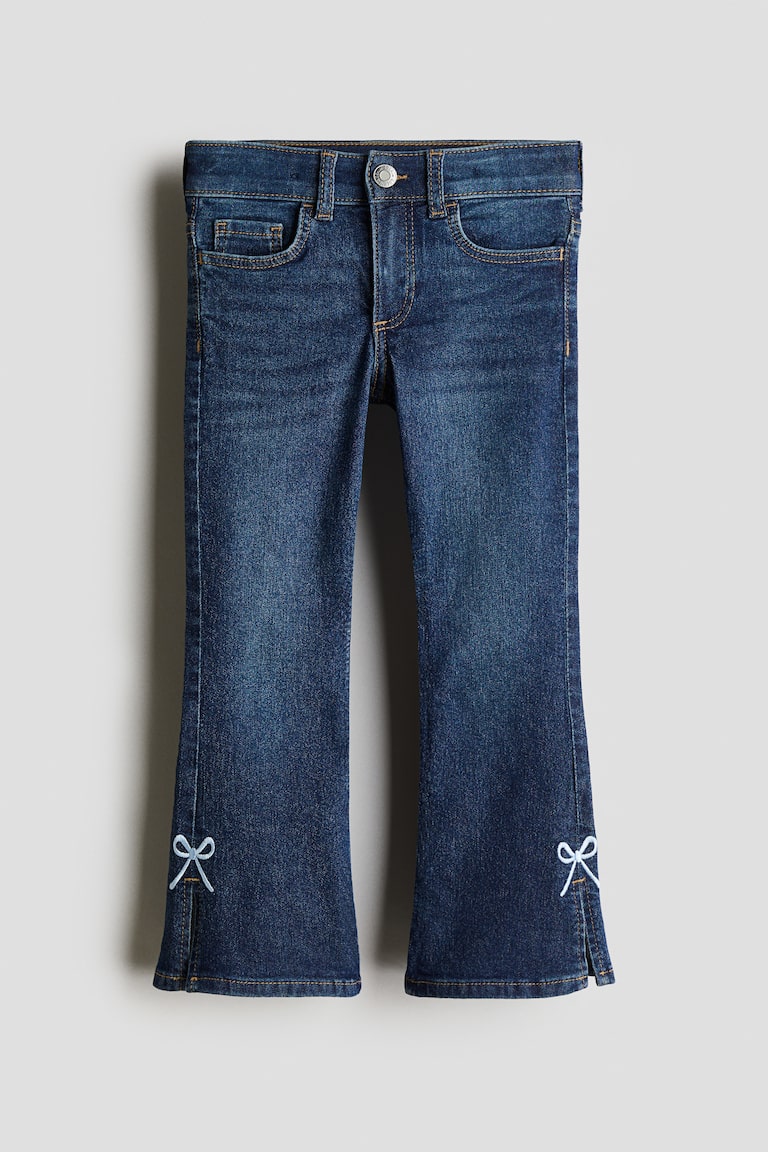 Flared Leg Jeans s ukrasnim vezom