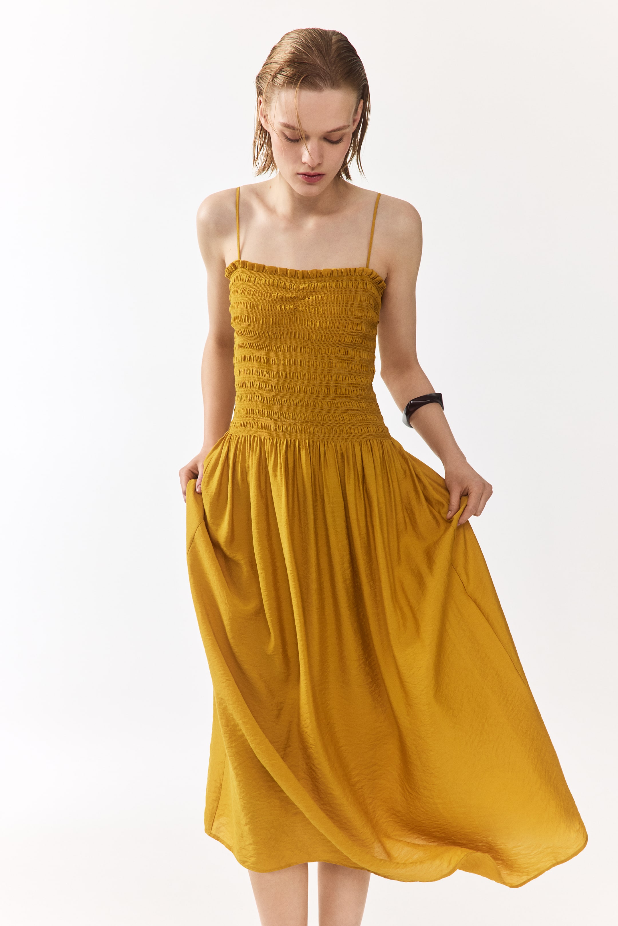 View larger image: Smocked-bodice strappy dress - Mustard yellow - Ladies | H&M MY 1