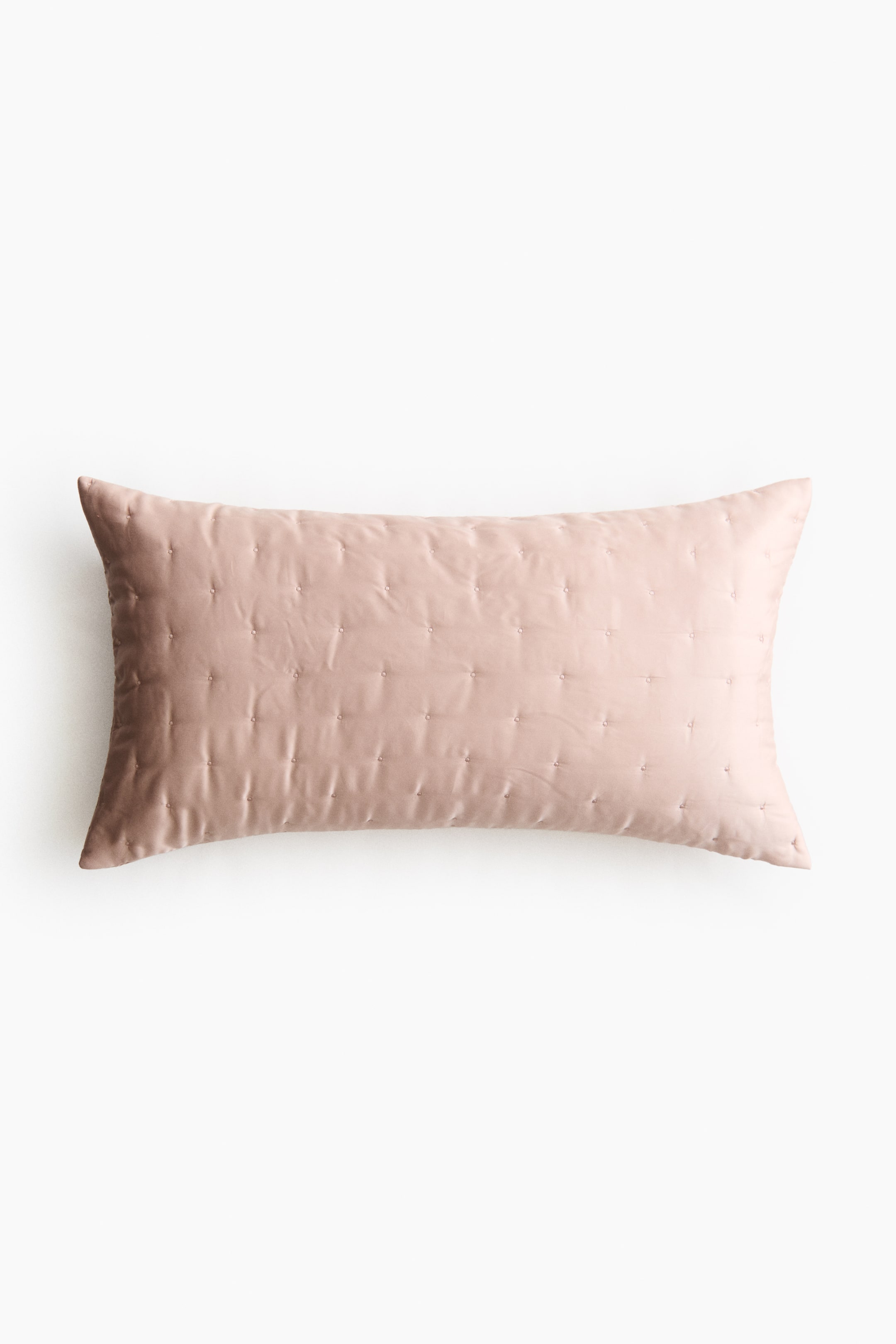 View larger image: A light pink, rectangular cushion cover is presenting its FRONT. It is made from a soft lyocell weave with a slight sheen, and its lightly padded front is displaying quilt knots arranged in a grid pattern.