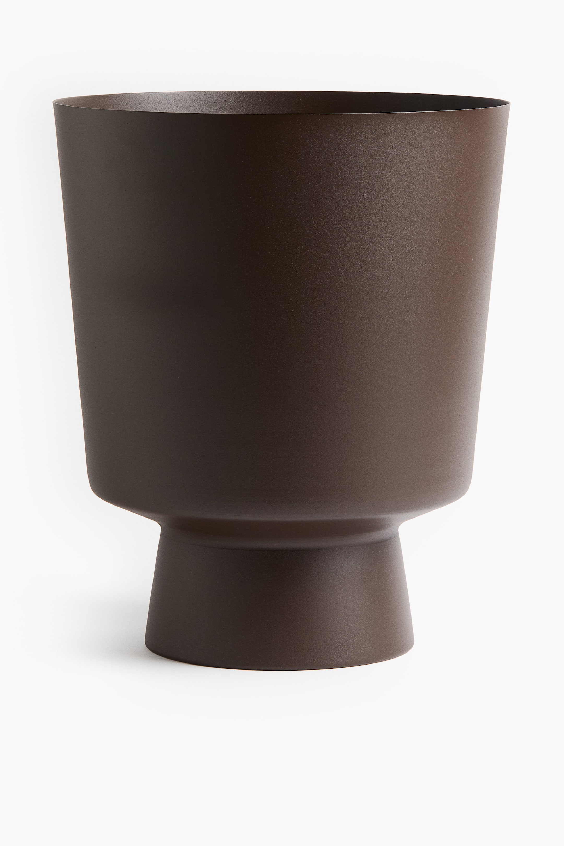 View larger image: A matte dark brown planter is shown from the front, with a wide, subtly tapering upper body that narrows significantly to a distinct, flared pedestal base.