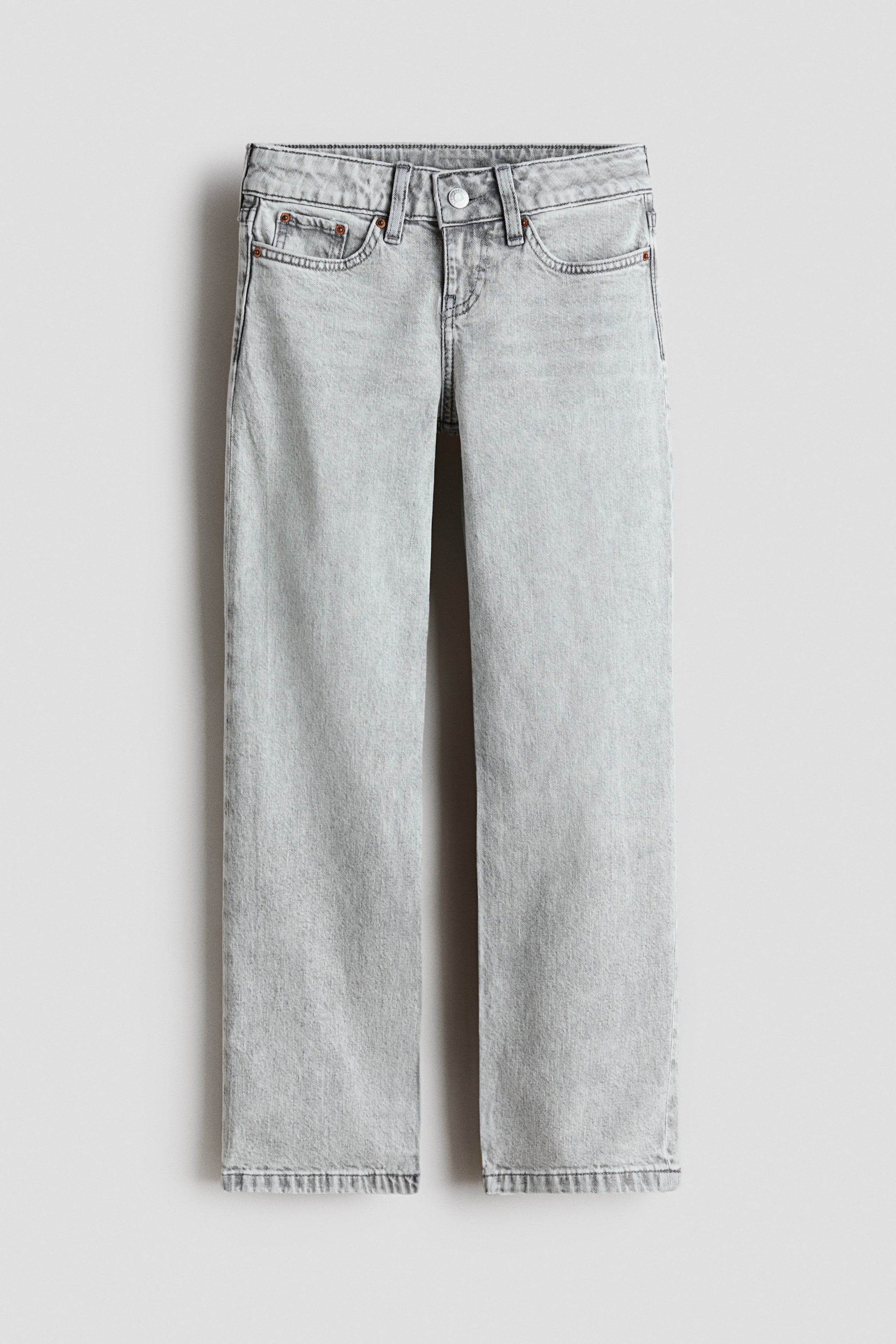 View larger image: Grey washed denim jeans are presenting from the FRONT, featuring a button closure and zip fly at the waist. They are displaying two front pockets, a coin pocket, and straight legs.