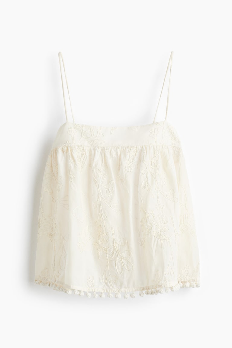 Bluza na bretele s vezenim motivima