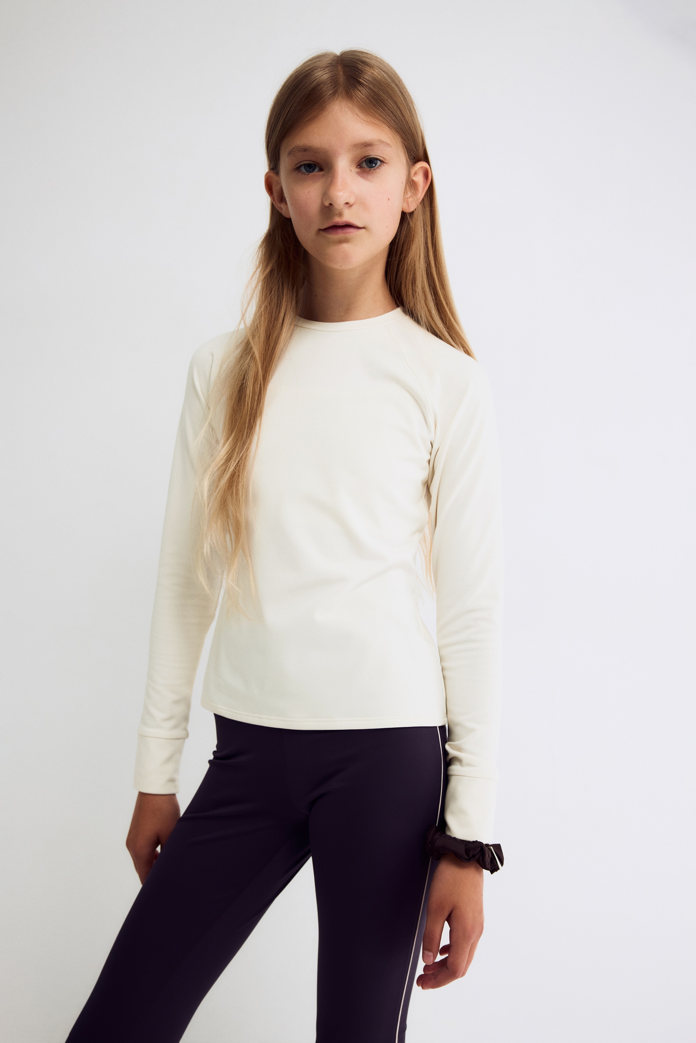 Warme sporttop met lange mouwen en SoftMove™ - Ivoorwit/Zwart