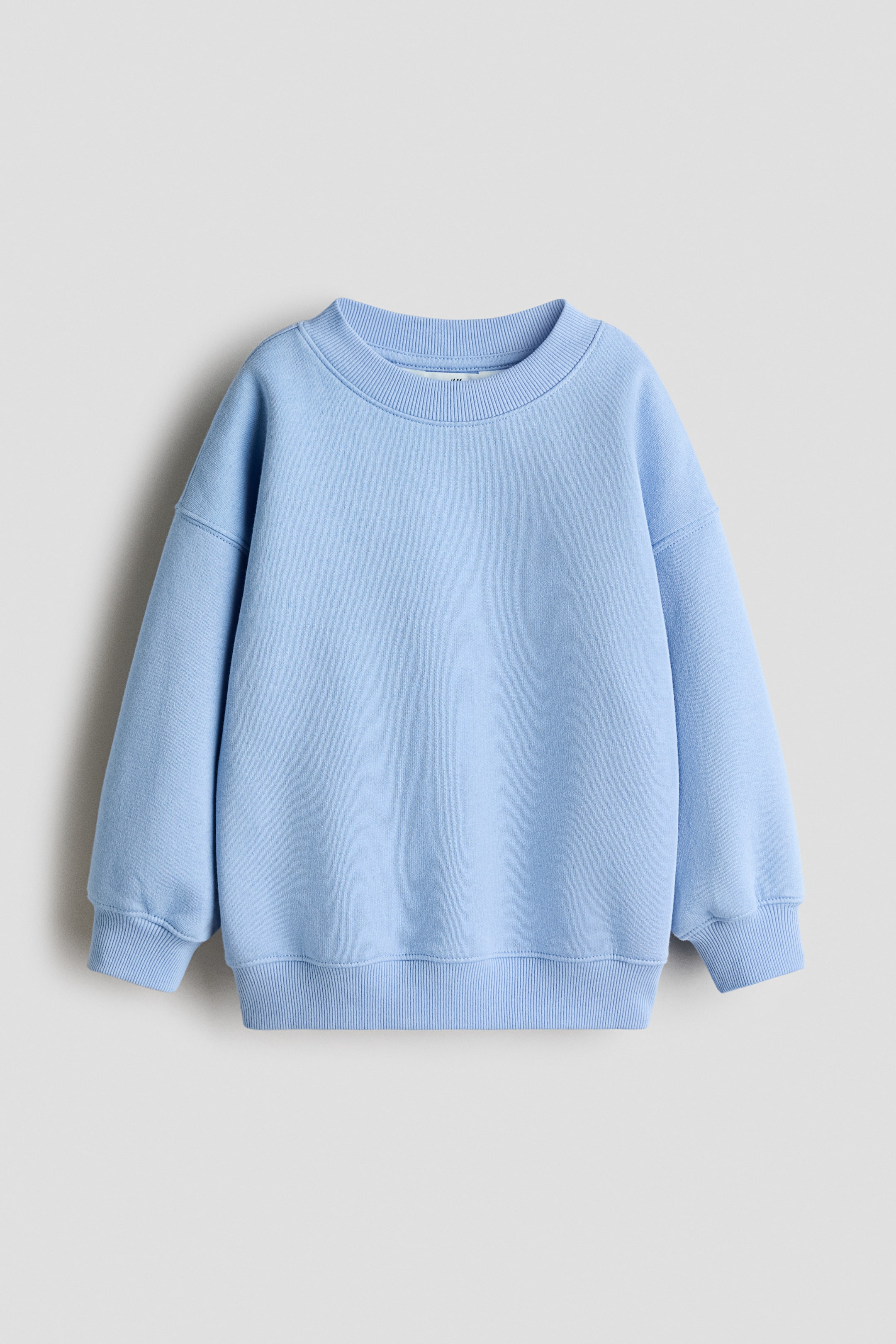 View larger image: Oversized brushed-inside sweatshirt - Light blue - Kids | H&M IE 1