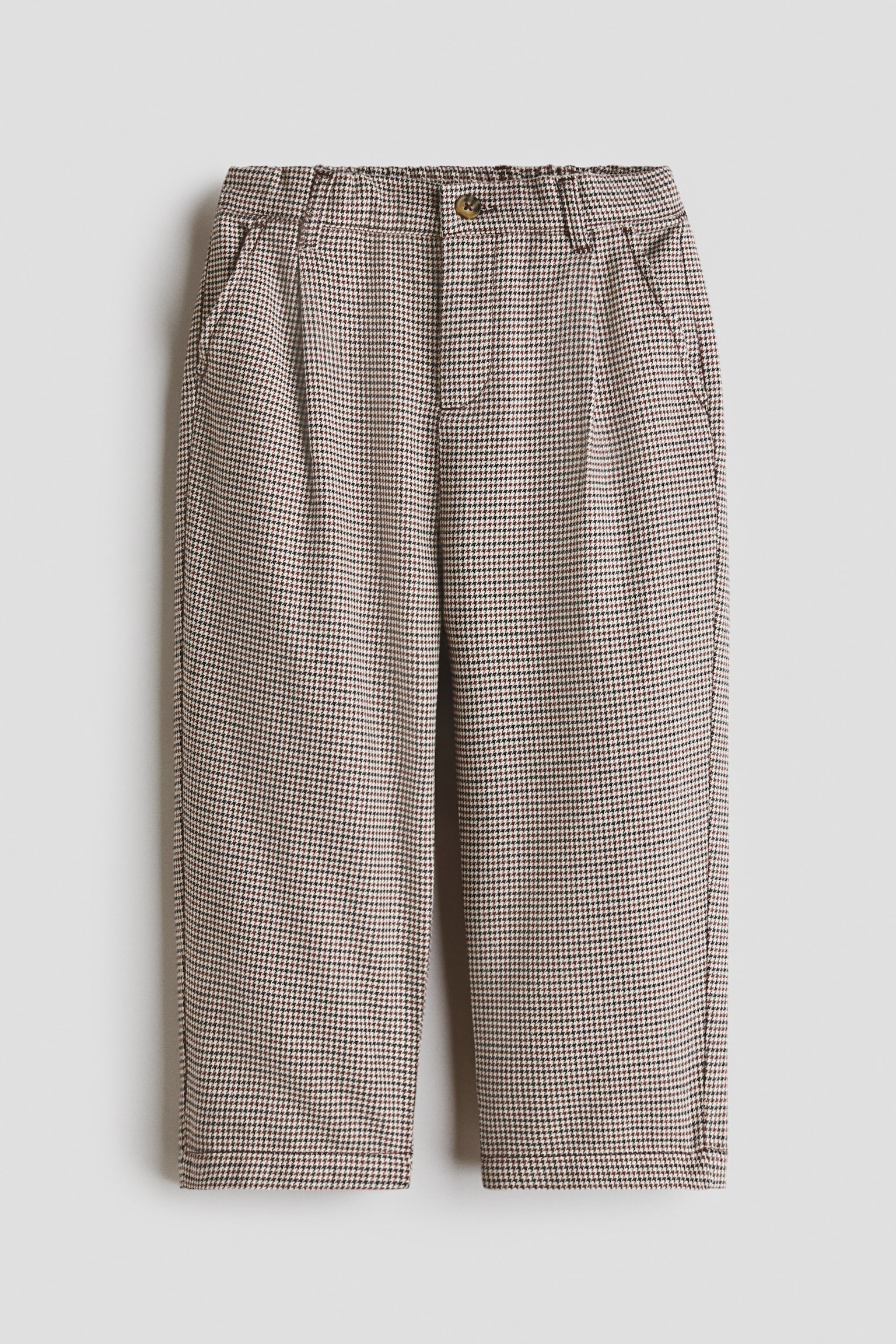 Детские брюки H&M Cotton Jersey Chinos, цвет: Бежевый / Гусиная лапка — фото 1