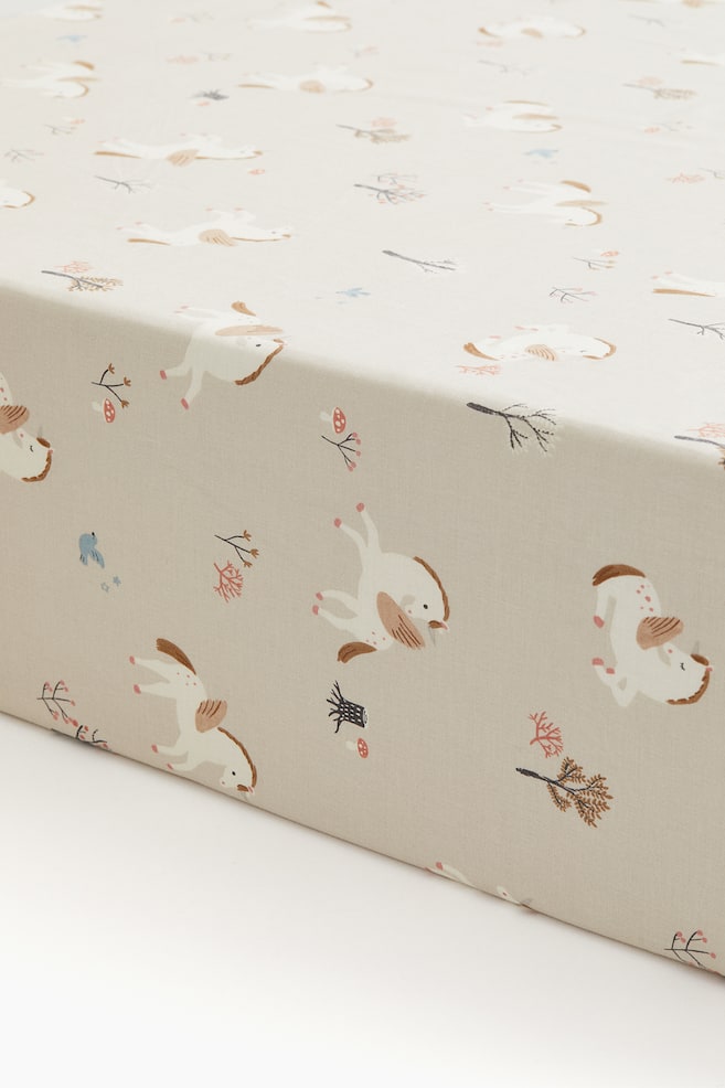 Patterned Cotton Fitted Sheet - Light beige/unicorns/Light green/vehicles/White/cherries/Light beige/dinosaurs/Pink/floral/Light pink/floral/Green/clover/Light blue/fish/Light taupe/floral/White/dotted/Light yellow/oranges/Cream/floral - 1