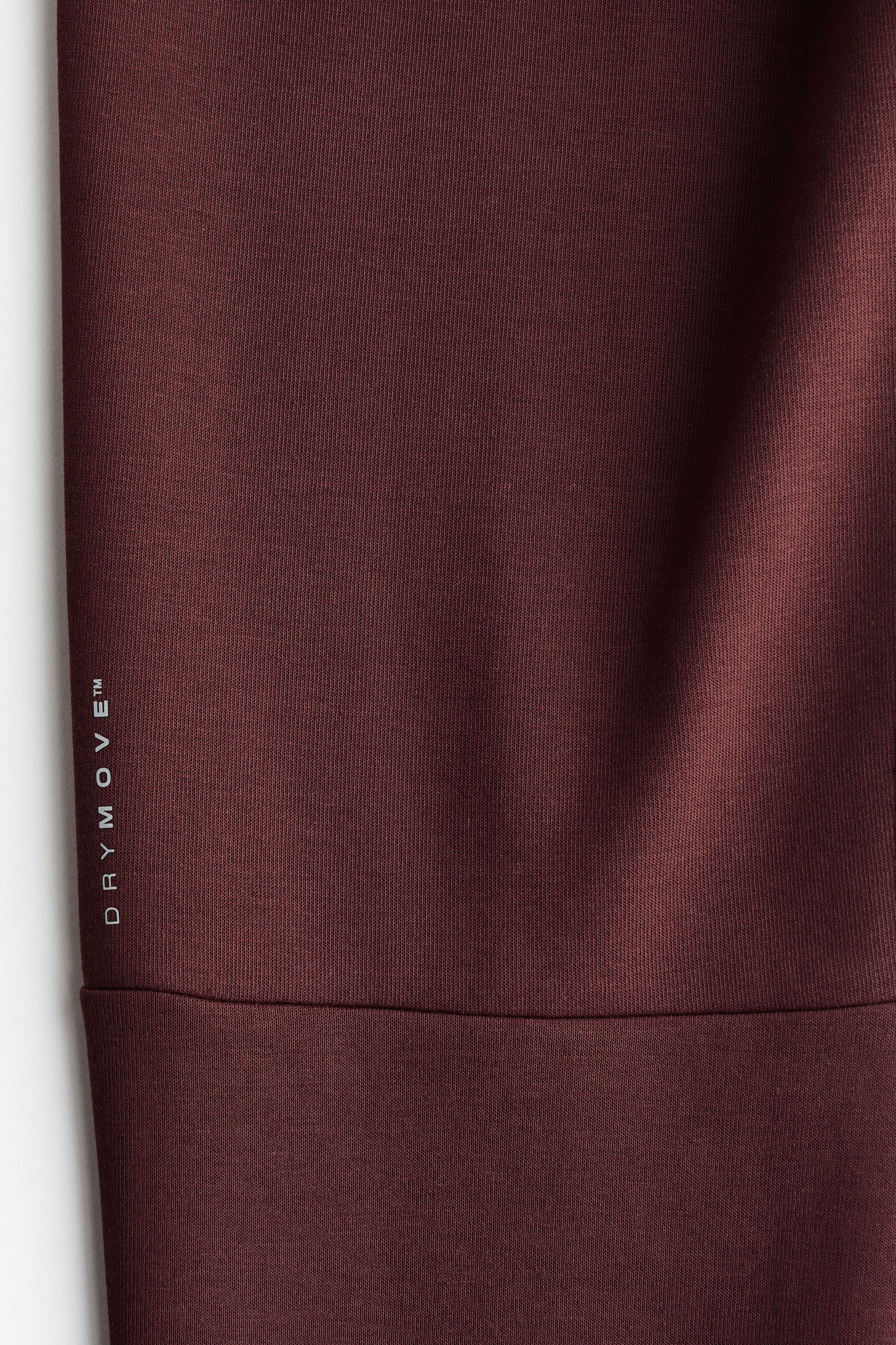 Xem ảnh lớn hơn: Quần jogger thể thao vải DryMove™ Slim Fit - Màu đỏ rượu - Men | H&M VN 3