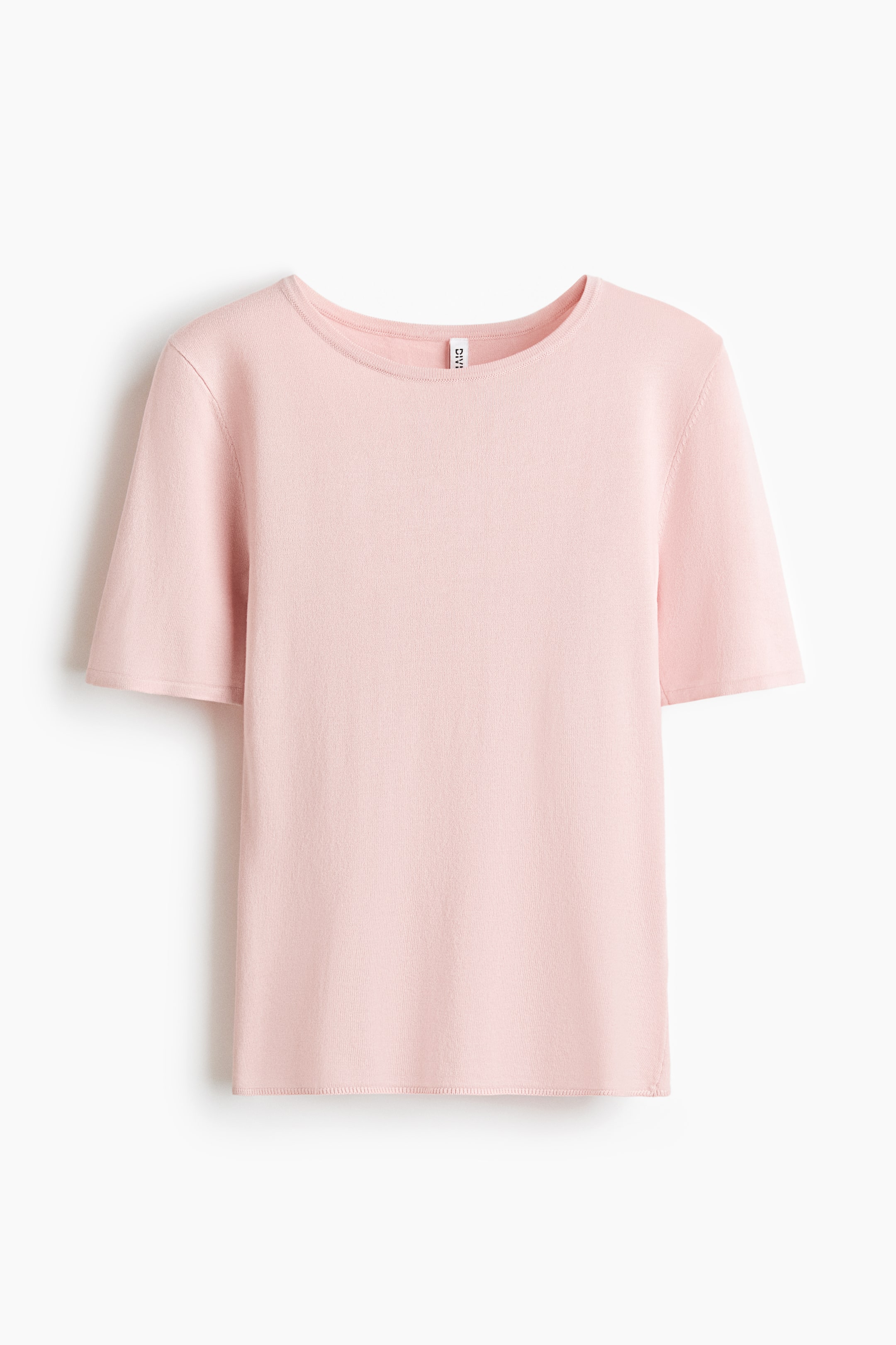 View larger image: A pink fitted t-shirt is displayed from the front, highlighting its fine knit texture. It features a ribbed round neckline, short sleeves with ribbed cuffs, and a ribbed hem.