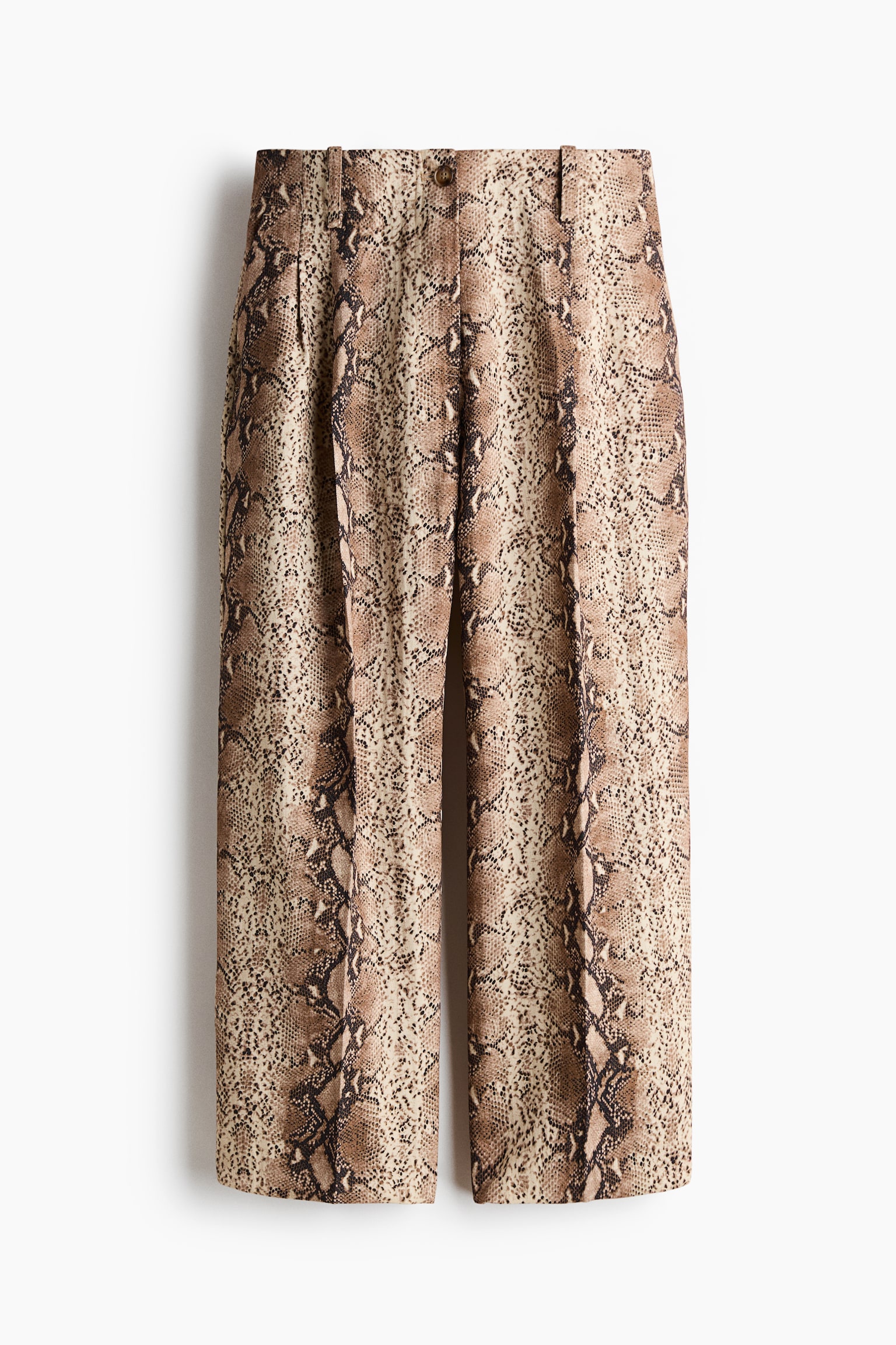 These front-facing, ankle-length, loose-fit trousers are displaying a snakeskin pattern in light brown and dark brown tones. They are featuring a regular waist with a visible button closure, front pleats, and diagonal side pockets. Vertical creases are running down the center of each straight leg. - 1