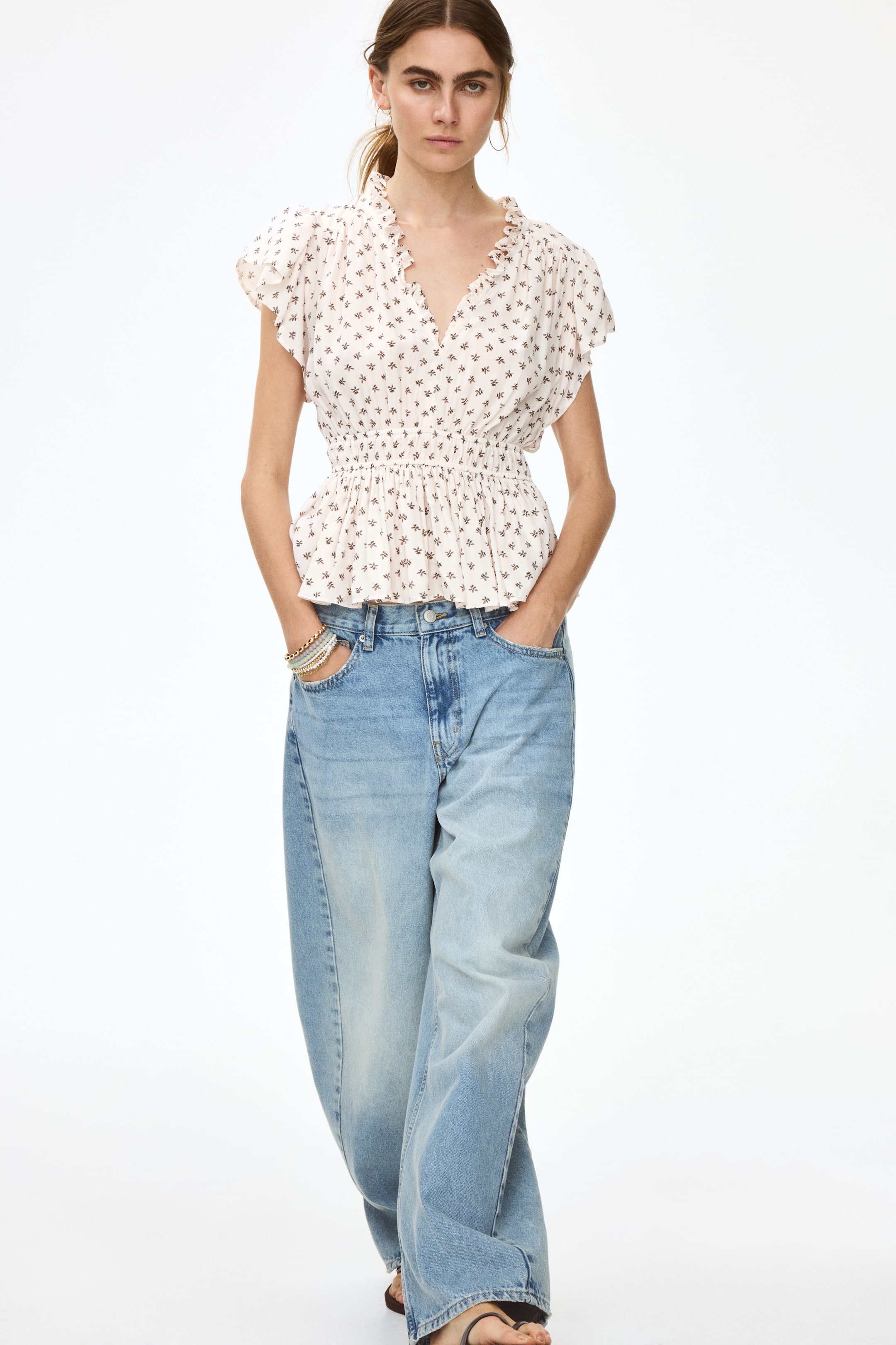 Flutter-Sleeved Peplum Blouse