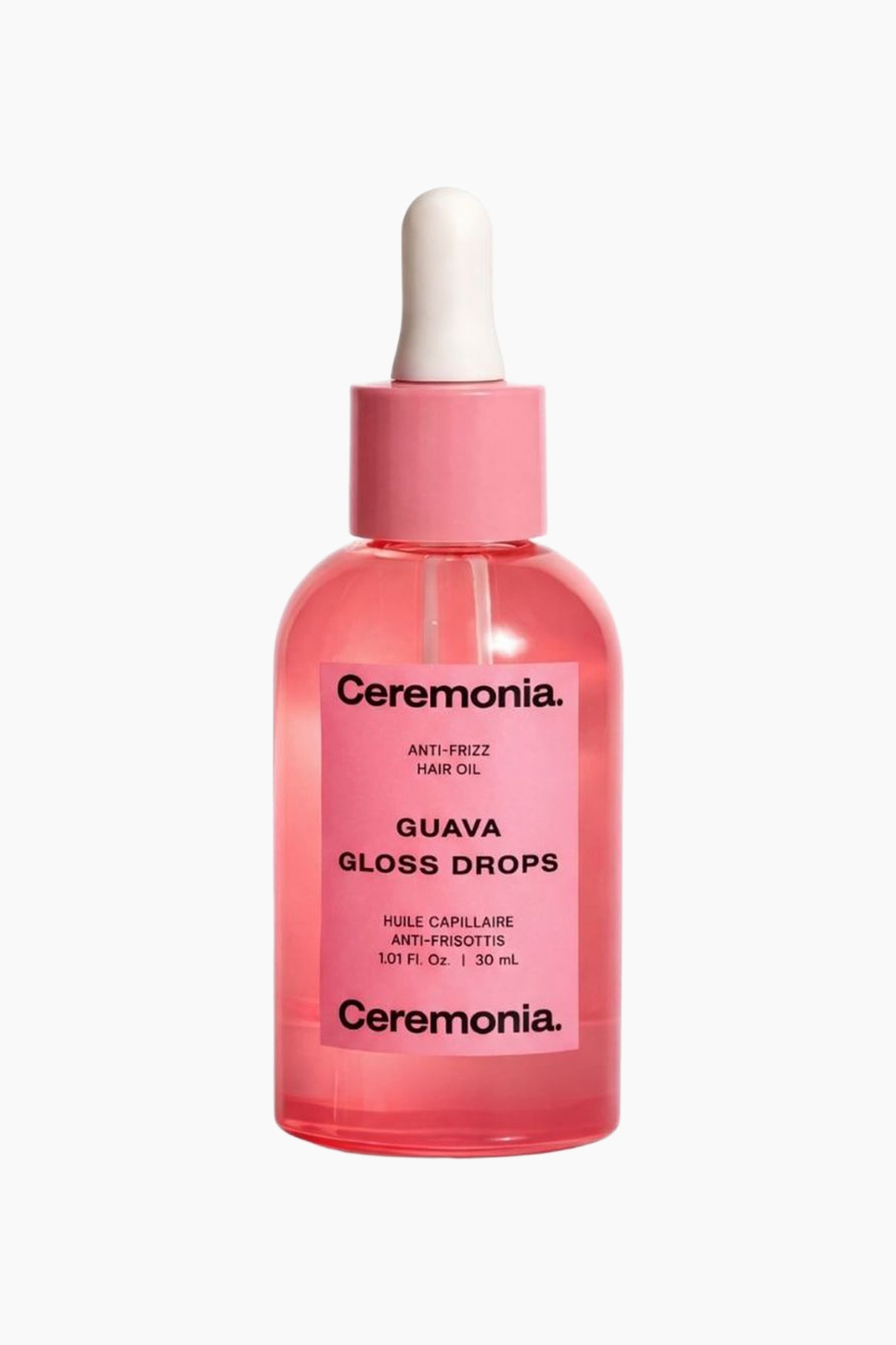 Vis større bilde: Ceremonia Guava Gloss Drops Anti-Frizz Hair Oil er en rosa, gjennomsiktig glassflaske som inneholder en rosa væske, toppet med en rosa kork og en hvit pipette, og har en rosa etikett med svart tekst.