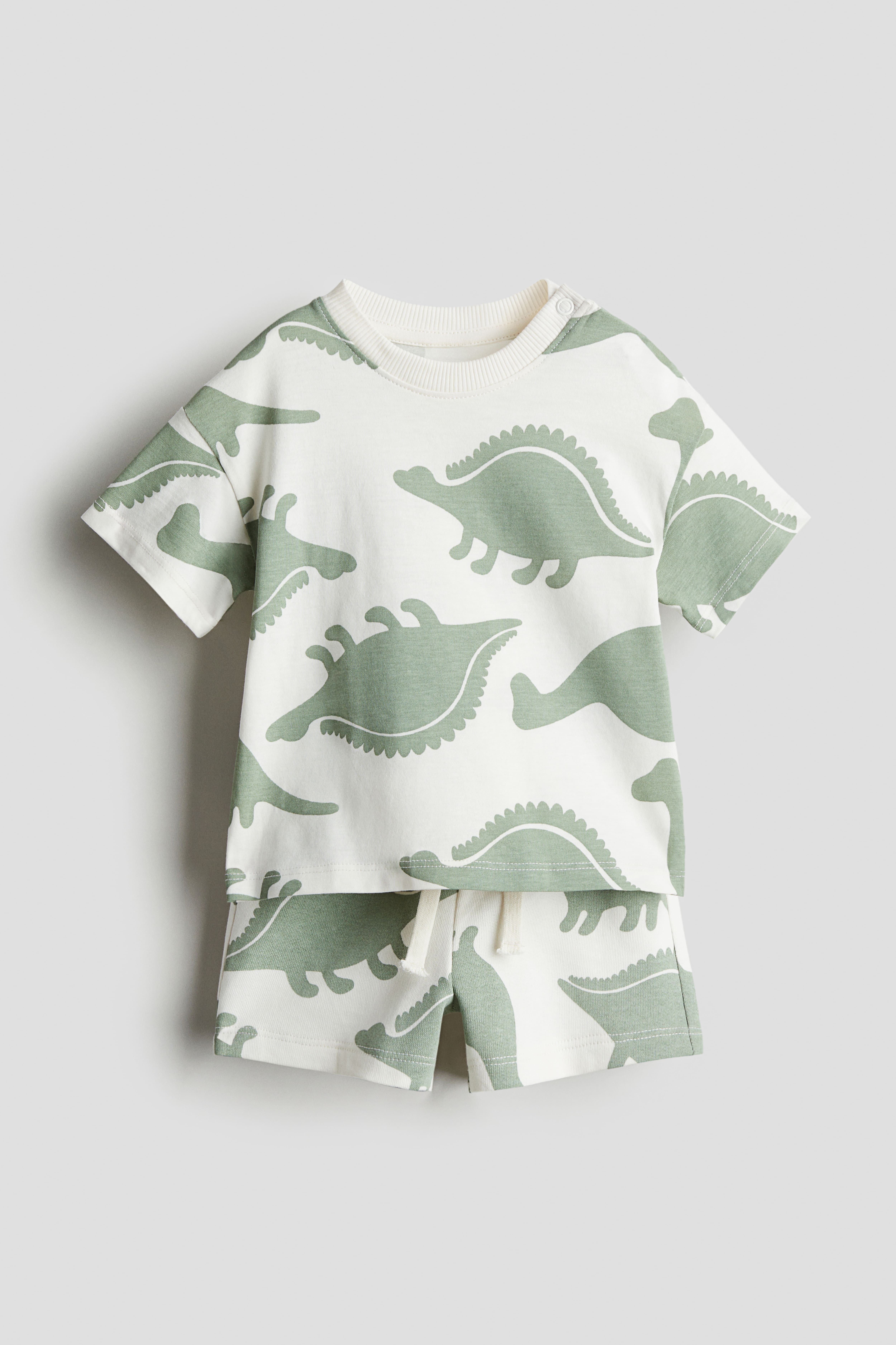 Camiseta dinosaurio shops niño h&m