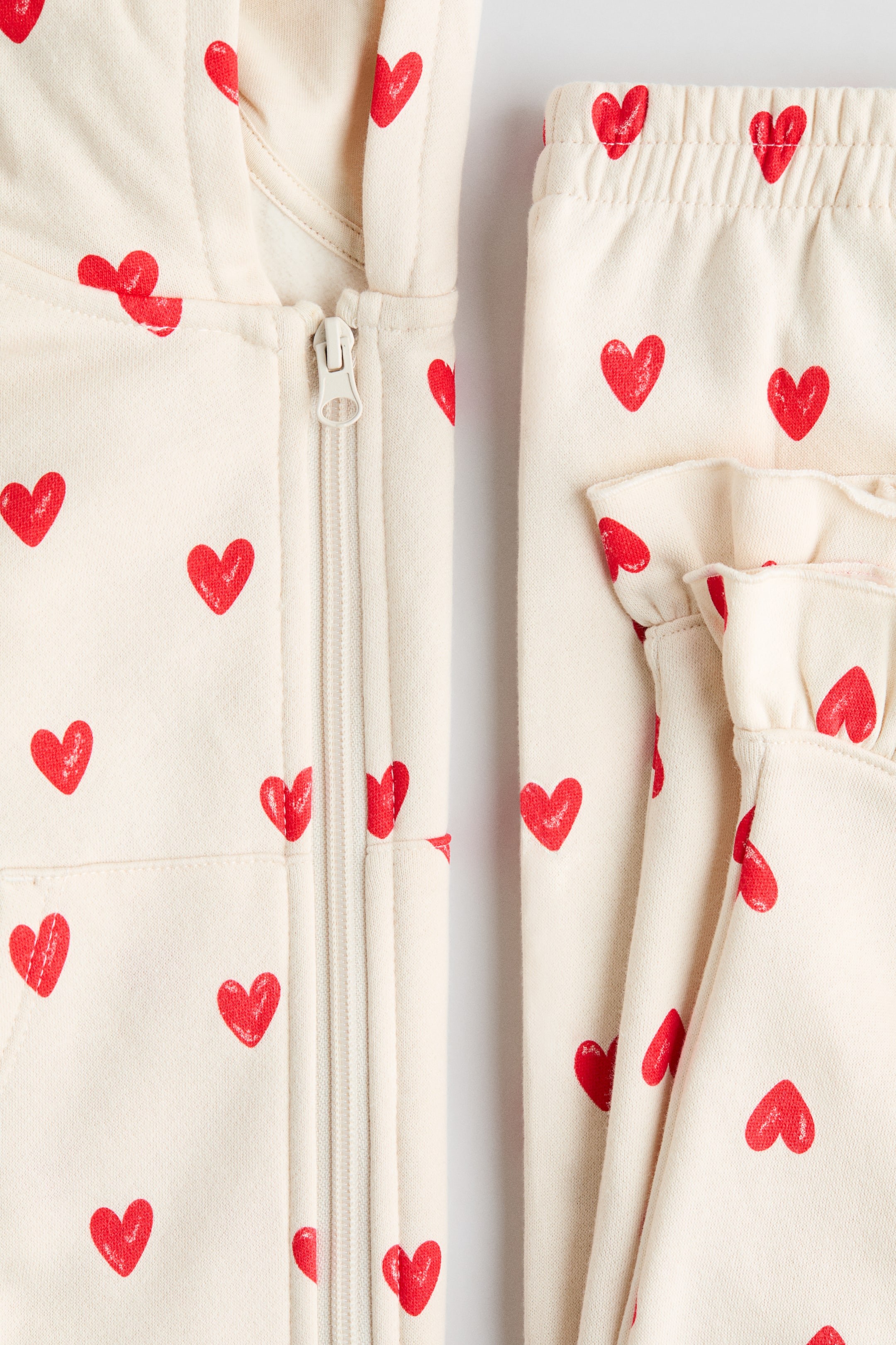 Ampliar la imagen: 2-piece printed sweatshirt set - Beige claro/Corazones - Kids | H&M MX 2