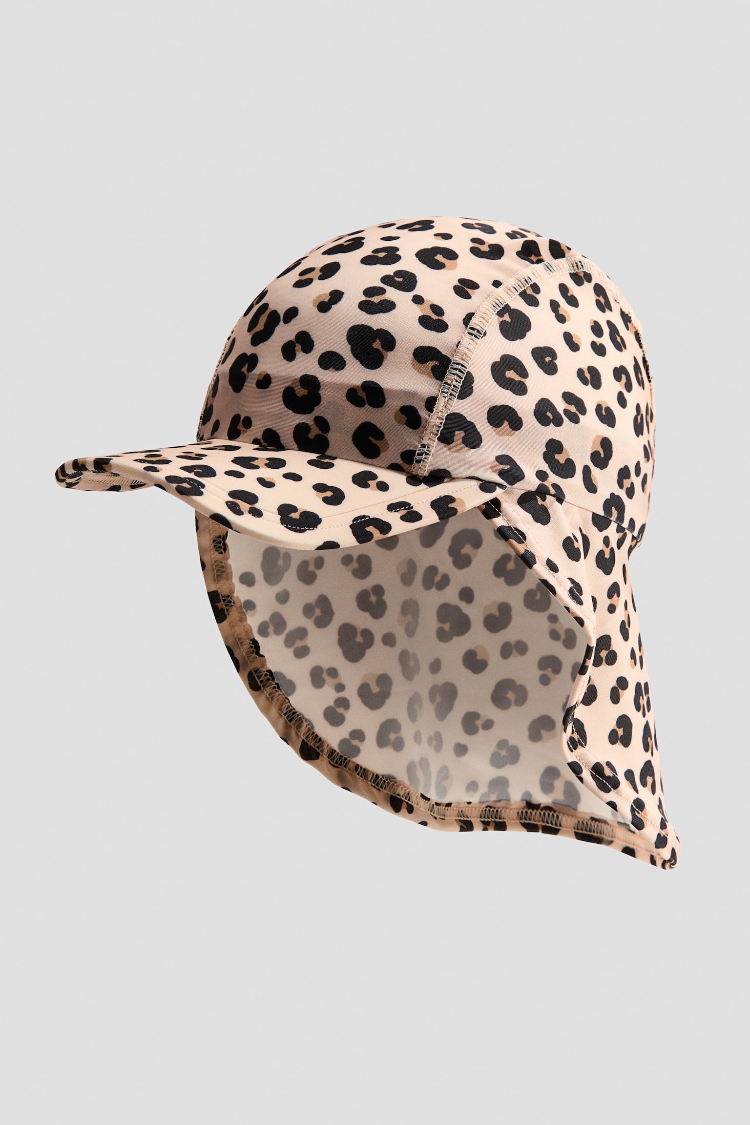 Sonnencap mit UPF 50 - Hellbeige/Leopardenprint