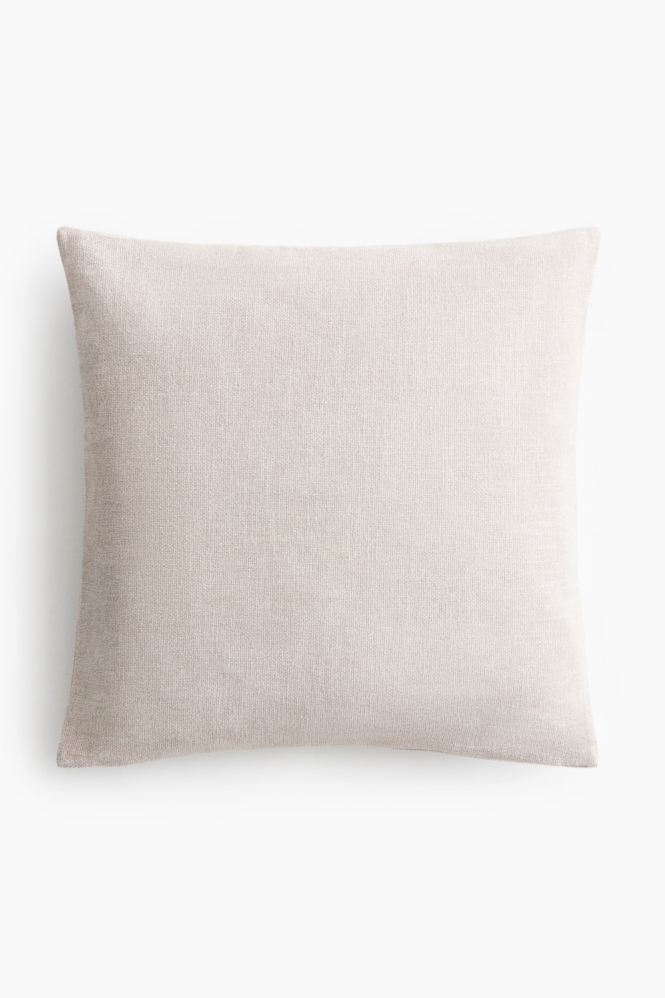 View larger image: A rectangular pillow showcasing a light beige, subtly textured woven fabric.
