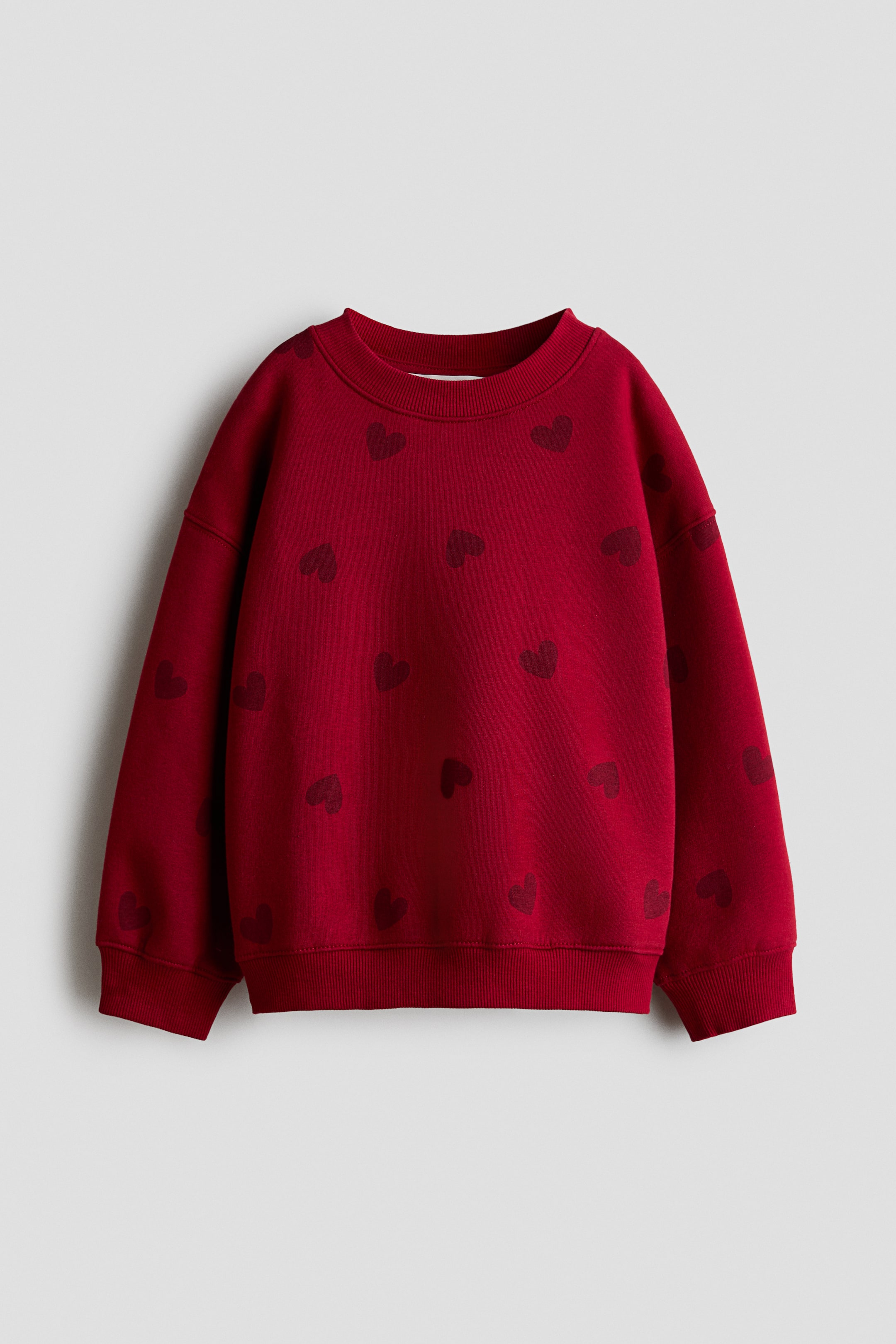 View larger image: Brushed-inside sweatshirt - Red/Hearts - Kids | H&M 1