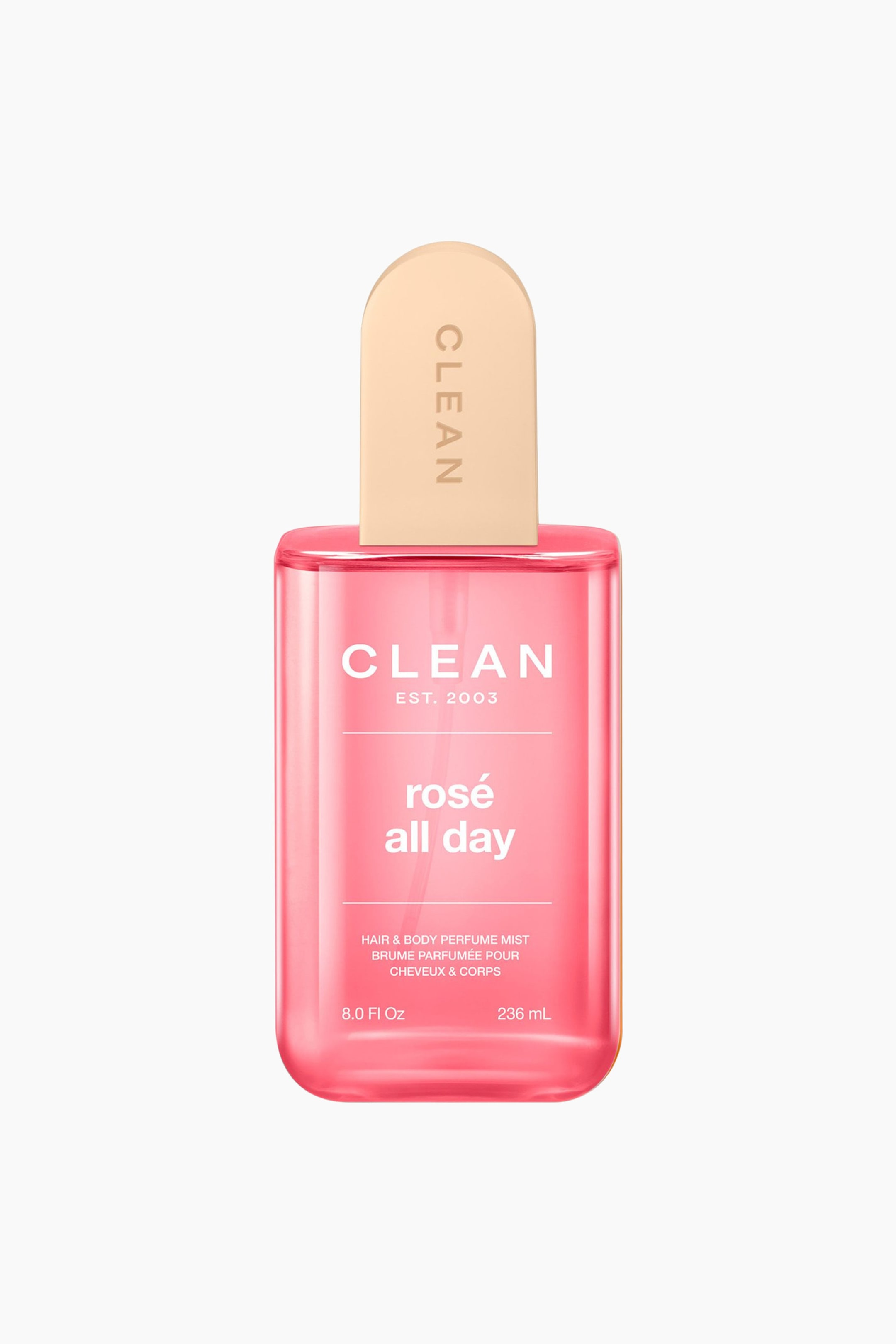 Se større billede: En rektangulær, gennemsigtig flaske med CLEAN rosé all day Hair & Body Perfume Mist vender fremad. Den er fyldt med lyserød væske, og en lys beige, paddel-formet hætte med "CLEAN" præget vertikalt dækker toppen. Hvid tekst på flasken viser mærkenavnet, produktnavnet og volumen.