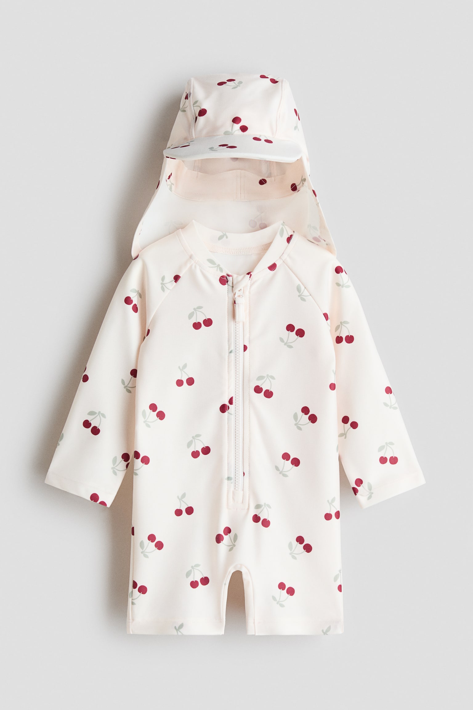 Solskyddsset UPF50 - Ljusrosa/Körsbär/Ljusblå/Randig/Vit/Havsdjur/Rosa/Blommig/Ljusgrön/Leopard/Ljusturkos/Palmer/Persika/Fiskar/Crèmevit/Fiskar/Crèmevit/Blommig