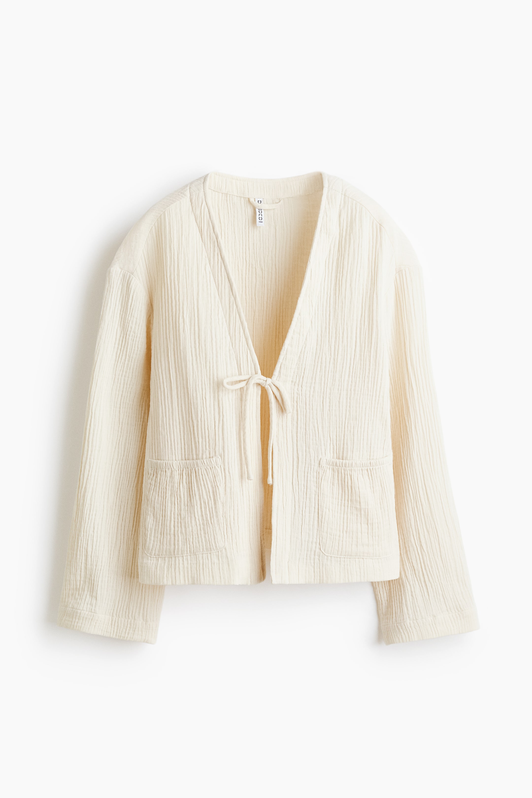 View larger image: Tie-Front Muslin Jacket - Light beige - Ladies | H&M US 1