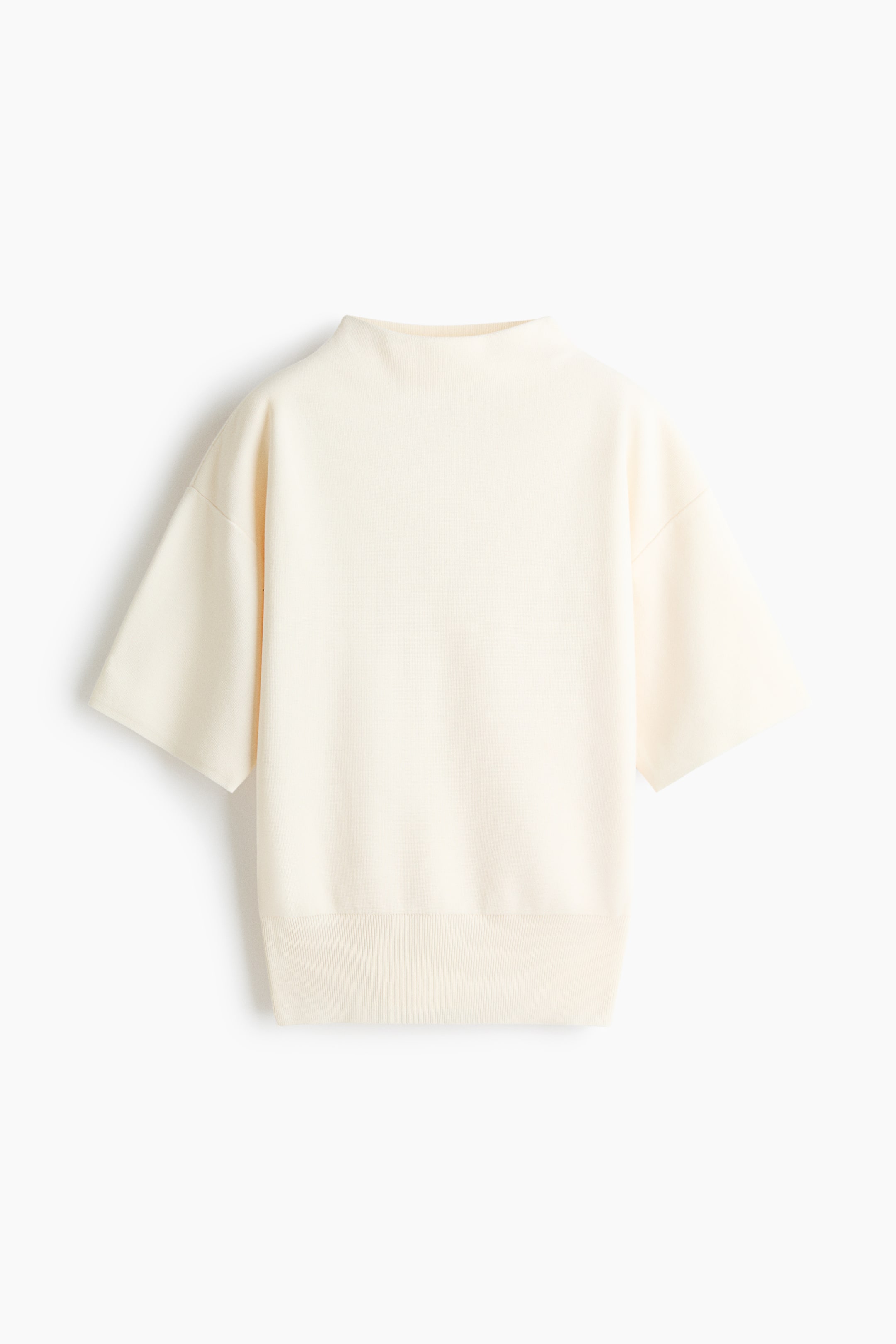 View larger image: The cream knit top features a mock neck and wide short sleeves, with a ribbed hem, as it is facing away.