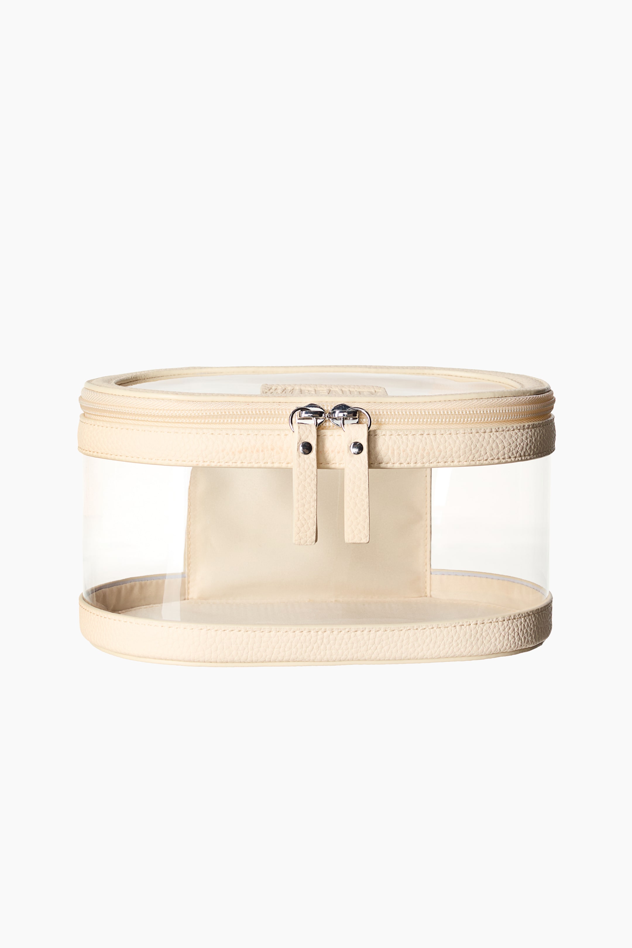 Grotere afbeelding bekijken: Een ovale make-up tas staat FRONT en heeft een transparant ontwerp met beige gecoate stofdetails op de bovenrand, onderkant en een intern paneel. Het toont een deksel met een dubbele ritssluiting.