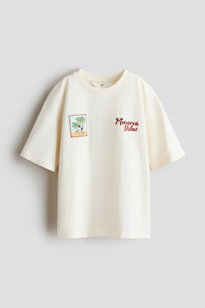 Playera Loose-fit con diseño - Crema/Snoopy/Gris/Spider-Man/Gris jaspeado claro/Spider-Man/Blanco/Hot Wheels/Rojo/Marvel Comics/Crema/Mickey Mouse/Blanco/Mickey Mouse/Rojo claro/Spidey/Blanco/Toy Story/Gris oscuro/Marvel Comics - 1