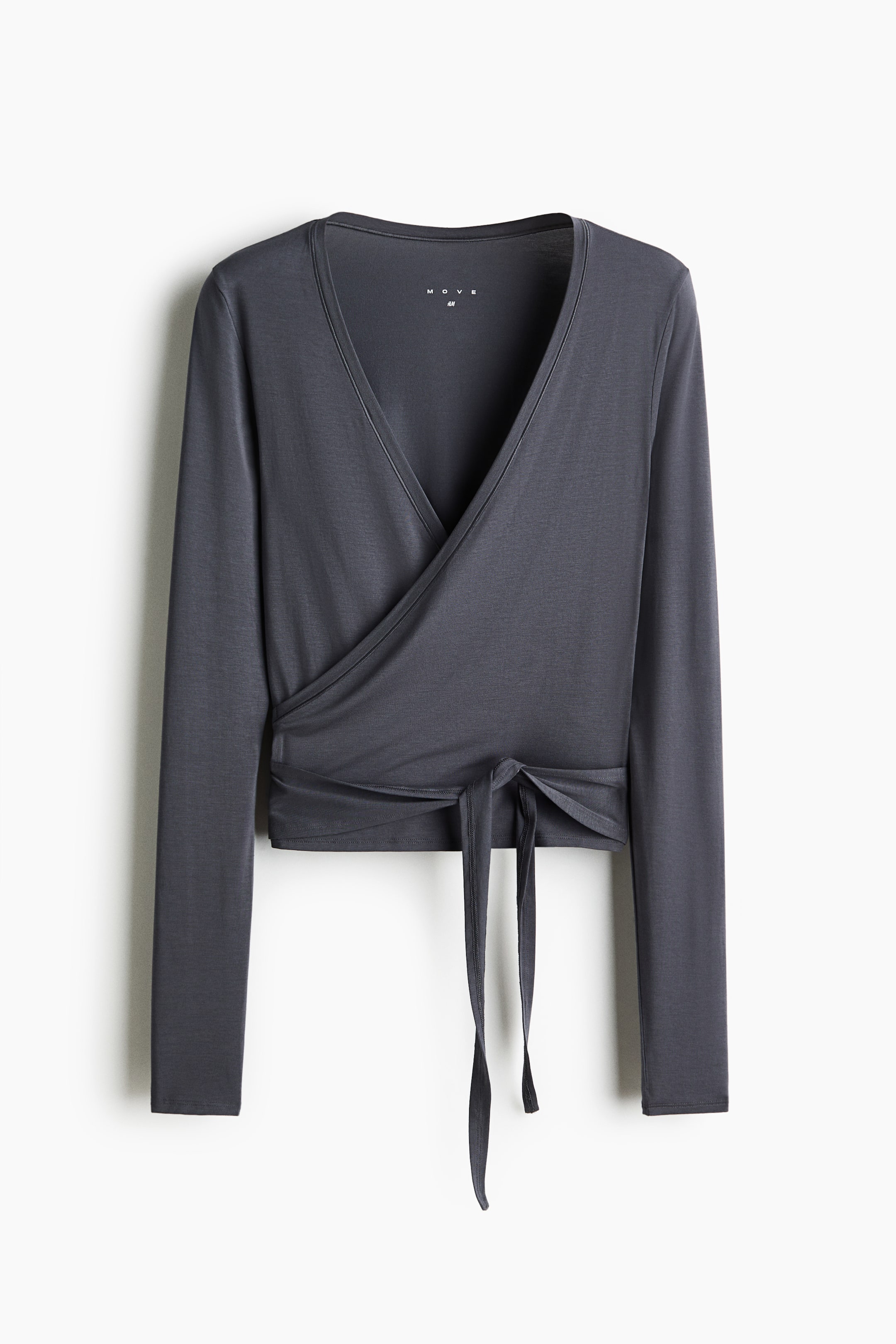 View larger image: A sports top in soft modal jersey features a slim fit, a deep V-neckline, and a wrapover front with ties that secure around the waist.