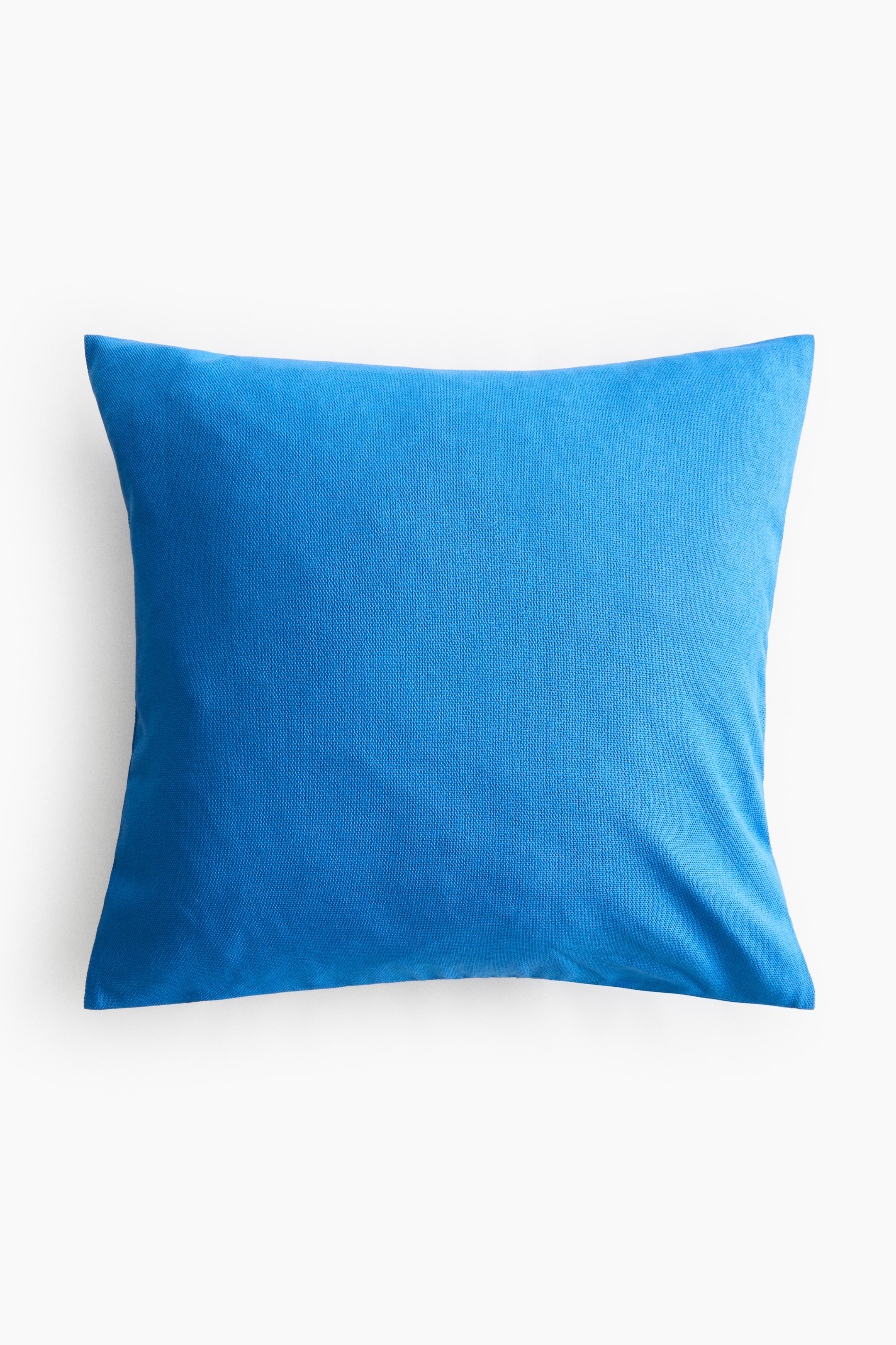 View larger image: A blue rectangular canvas cushion cover shown from the front, featuring a visible woven texture.