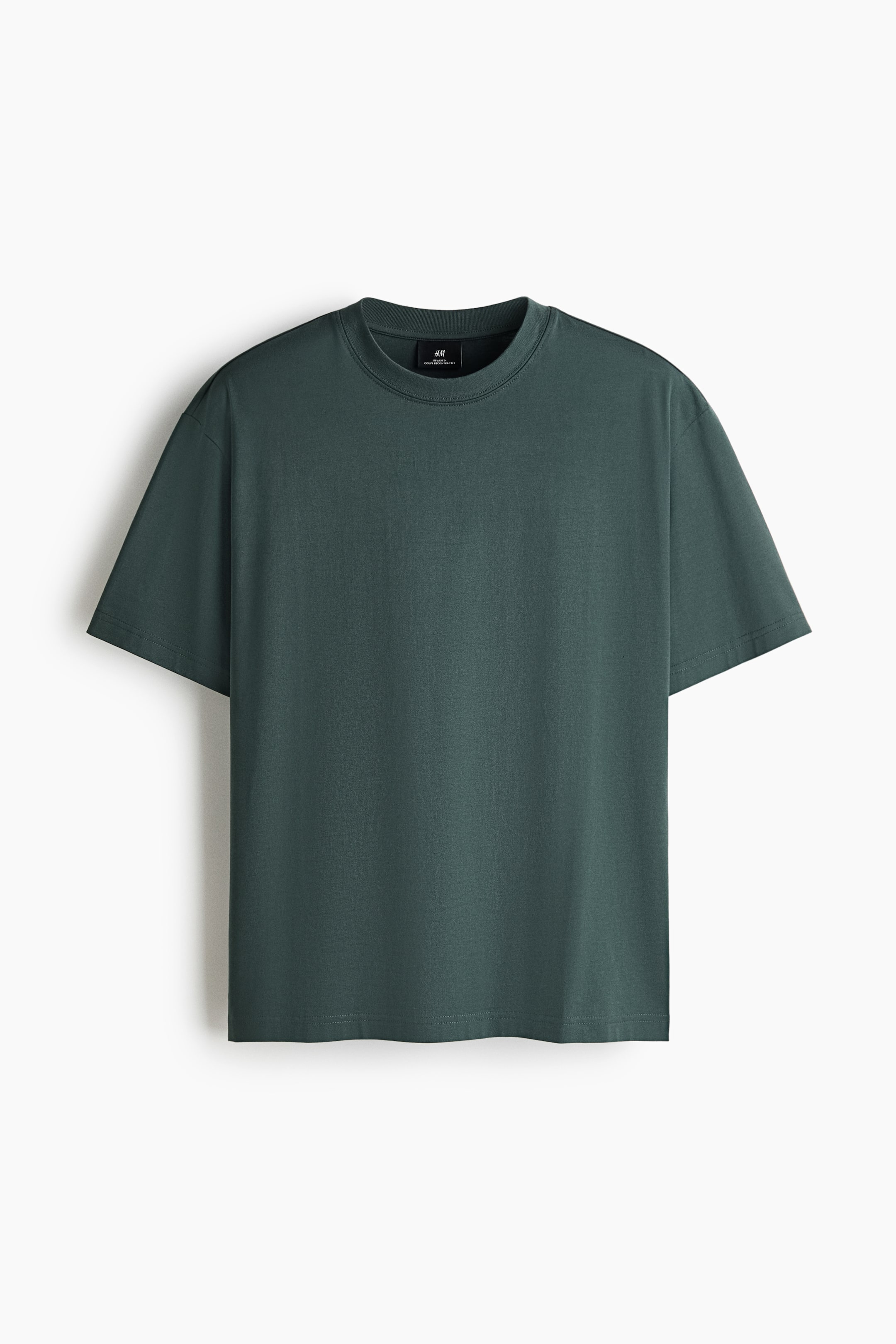 View larger image: A dark green T-shirt in midweight cotton jersey is presented from the FRONT, featuring a round, rib-trimmed neckline, dropped shoulders, a loose fit, and a straight-cut hem.