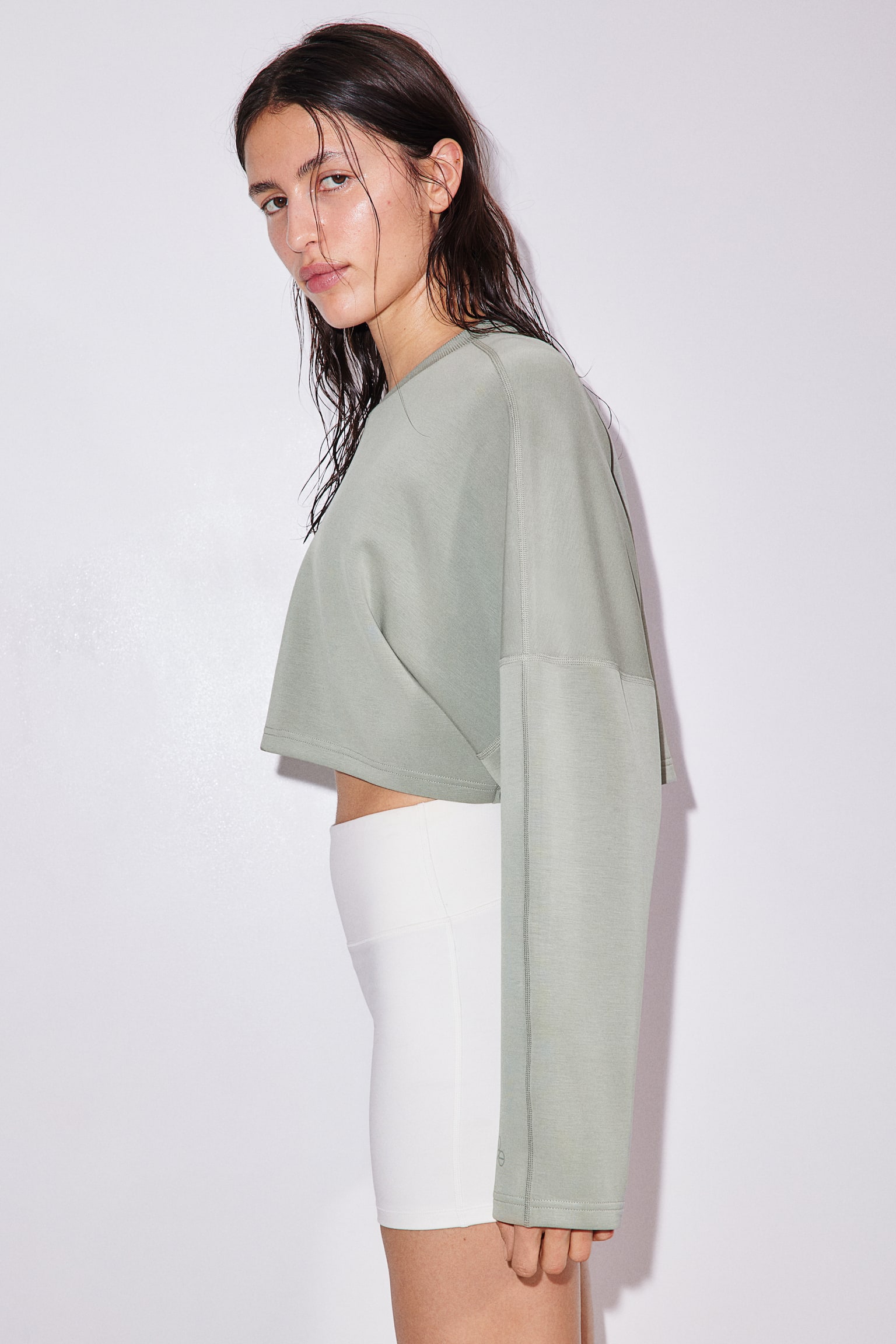 Cropped sports top in DryMove™ - Light khaki green - 2