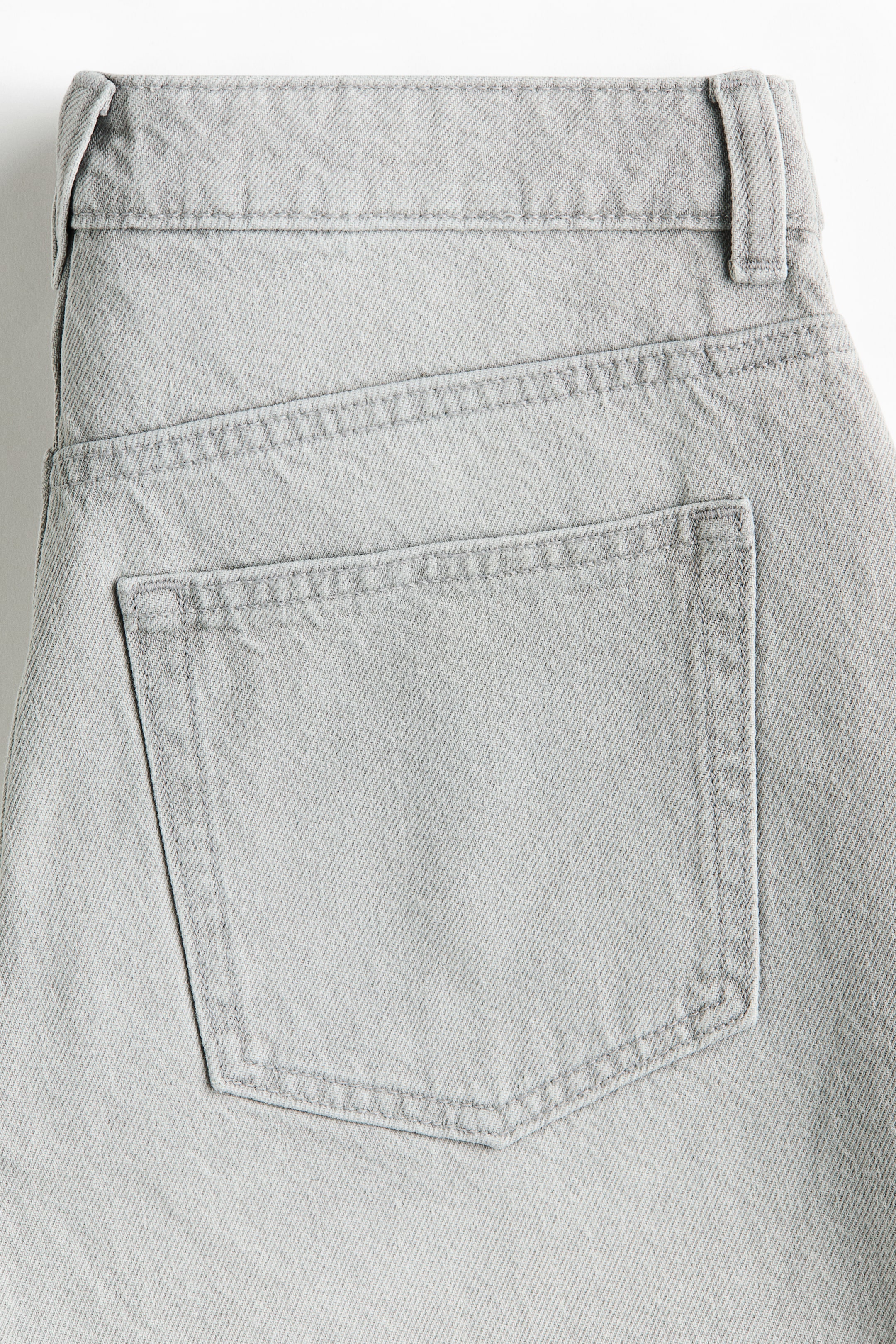 Raw-edge denim shorts