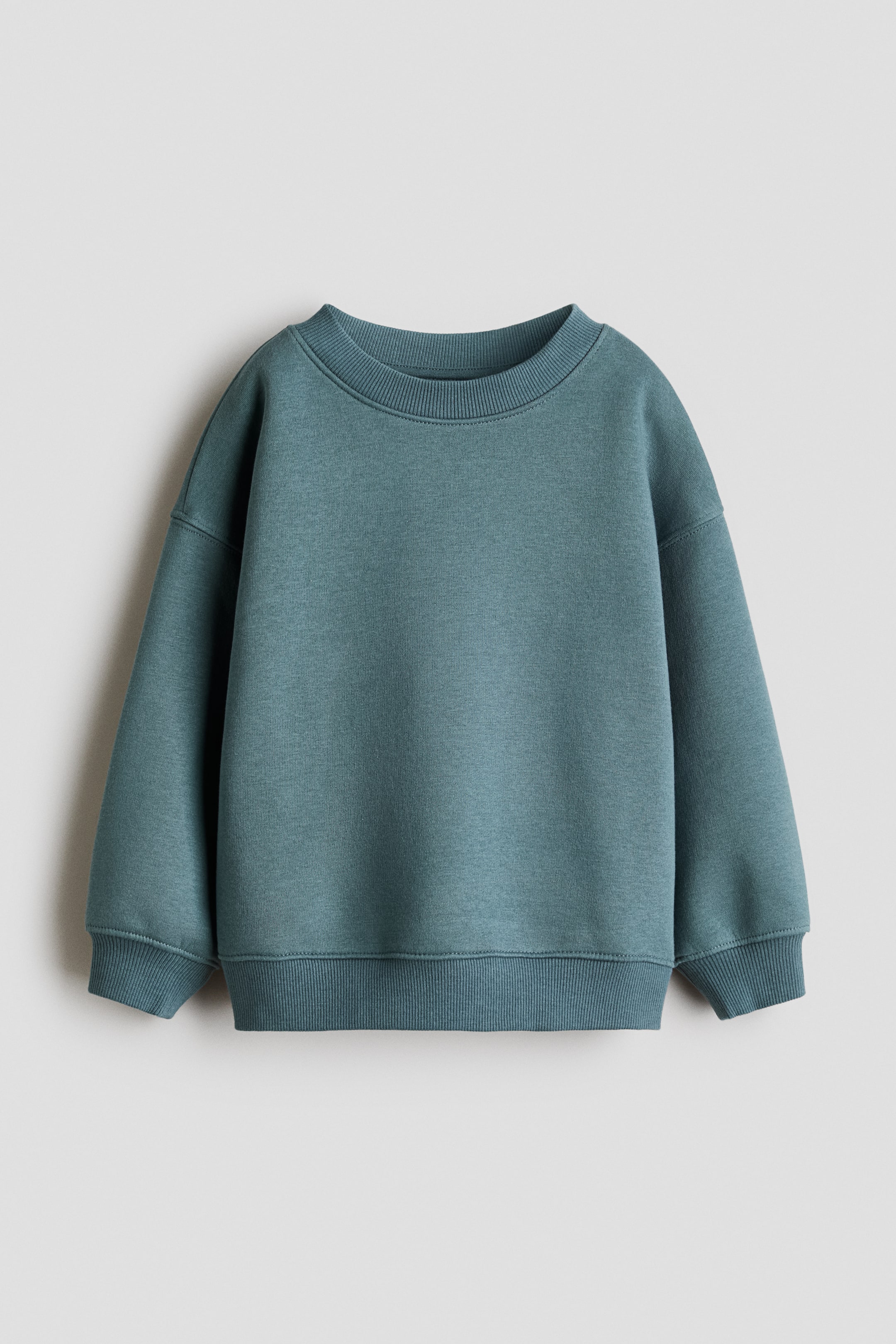View larger image: Brushed-inside sweatshirt - Turquoise - Kids | H&M 1