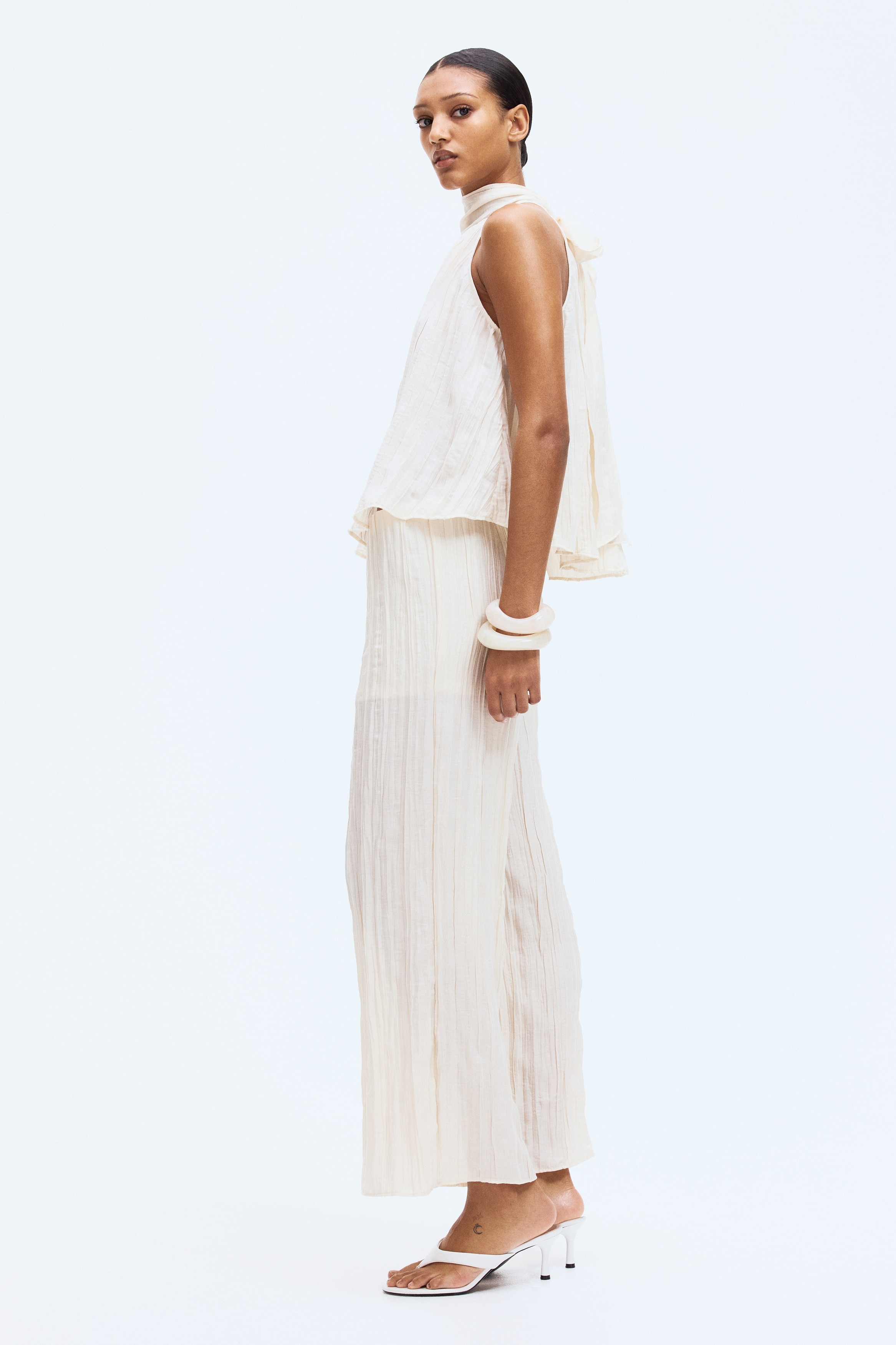 Crinkled trousers - Light beige
