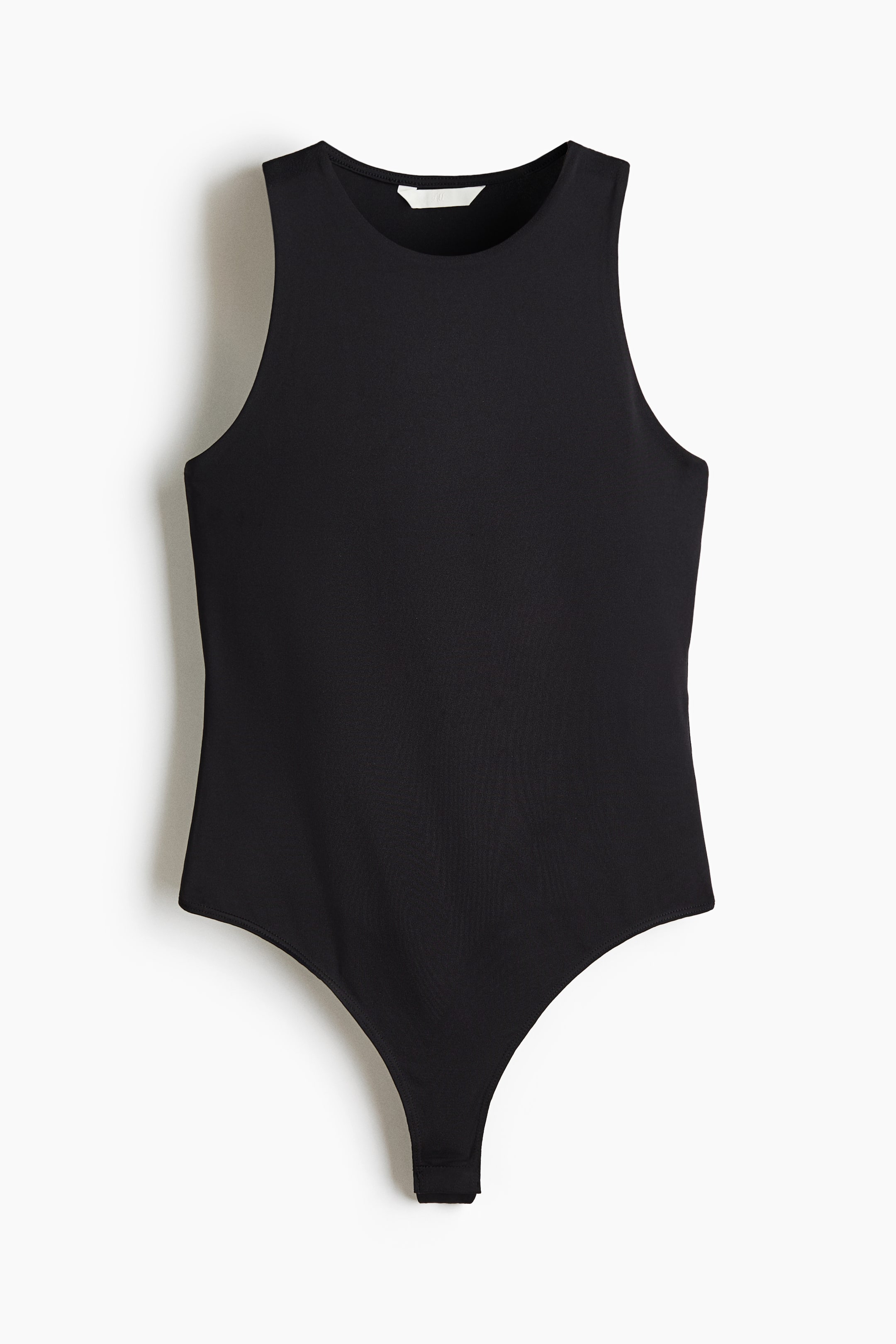 View larger image: A black sleeveless bodysuit is displaying its FRONT, featuring a crew neck and a thong-style bottom with a visible snap closure. A white label is showing inside the neckline.