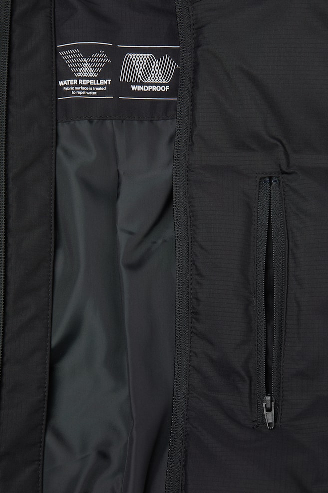 Water-repellent jacket - Black/Dark turquoise - 2