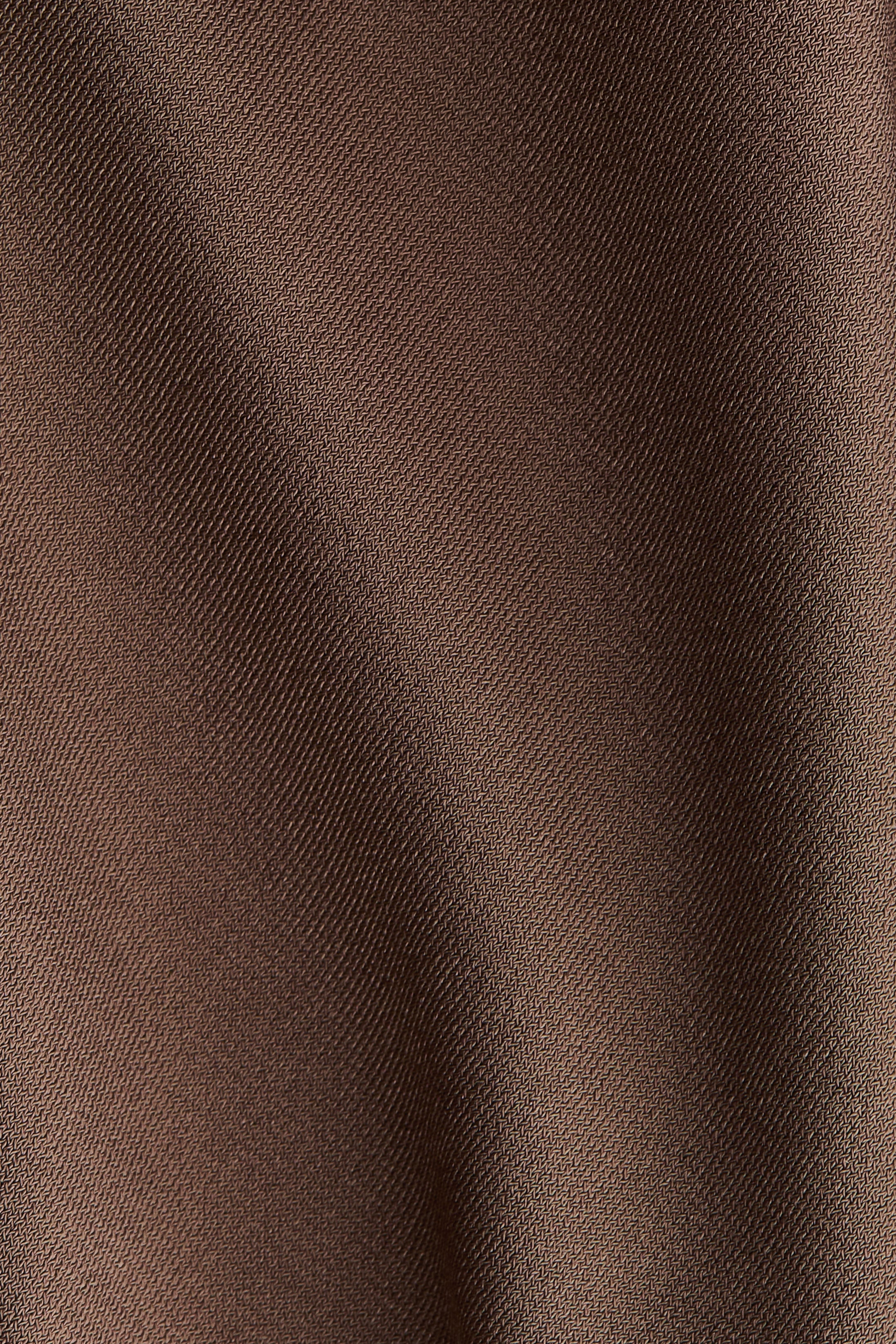 Haut asymétrique à effet drapé