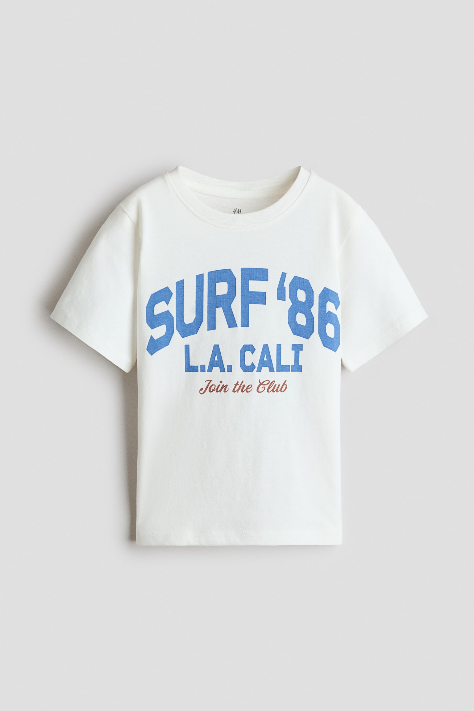 Printed T-Shirt - Ivory/Surf '86/Ivory/basketballs/Brown/6/Navy blue/Baseball Academy/Navy blue/soccer ball/Light green/Fun Days/Dark green/NYC/White/crabs/Cream/Sun Fun/Dark brown/Surfer/Blue/Shark Bay/Light blue/Miami/Cream/Salty Breeze/Dark gray/Pacific/Yellow/Little Bro/Ivory/coconut trees