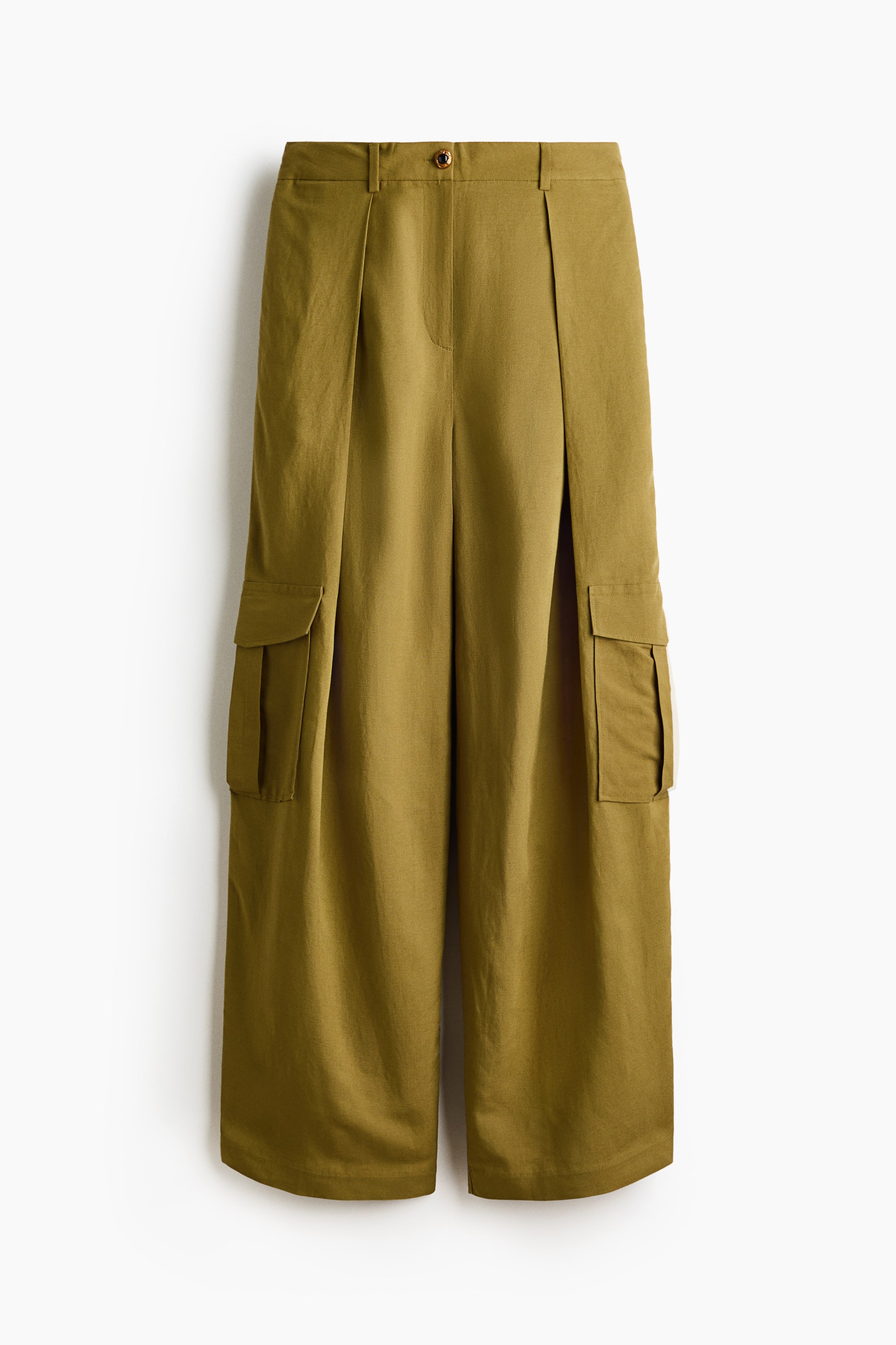View larger image: Olive green wide-leg cargo pants are showcasing their front, featuring a button closure, belt loops, and prominent pleats at the waist. Large flap cargo pockets are located on the outer side of each leg.