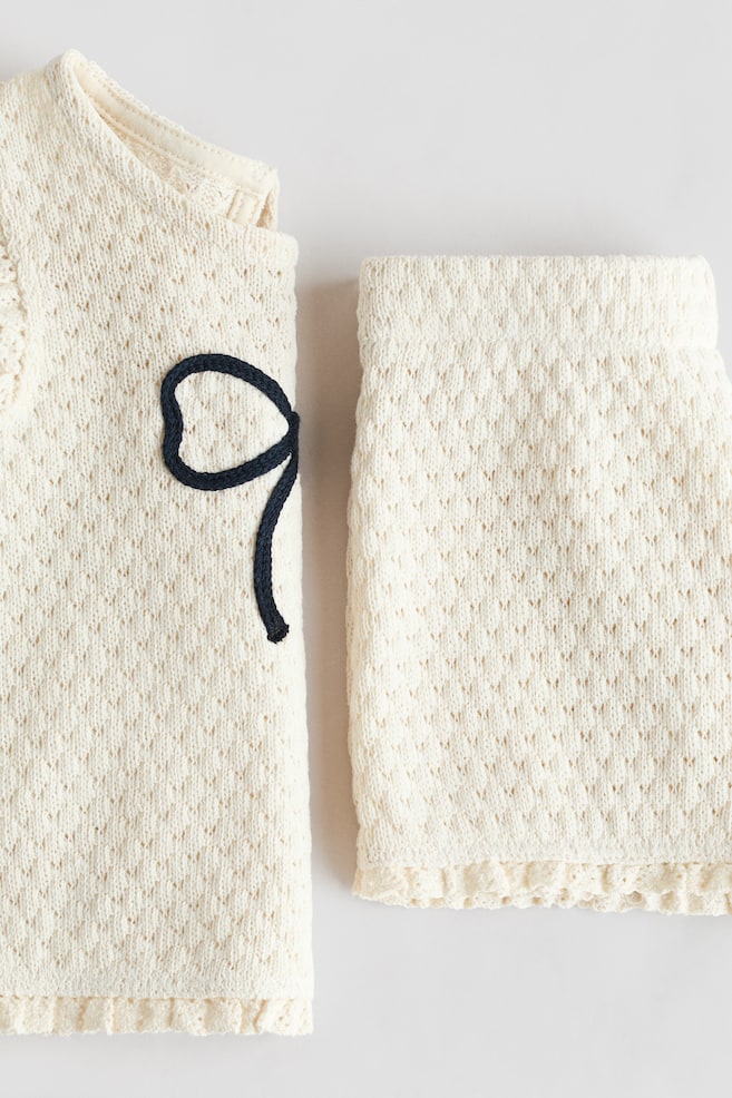Set 2 pezzi in maglia di cotone traforata-Crema/fiocco - 3