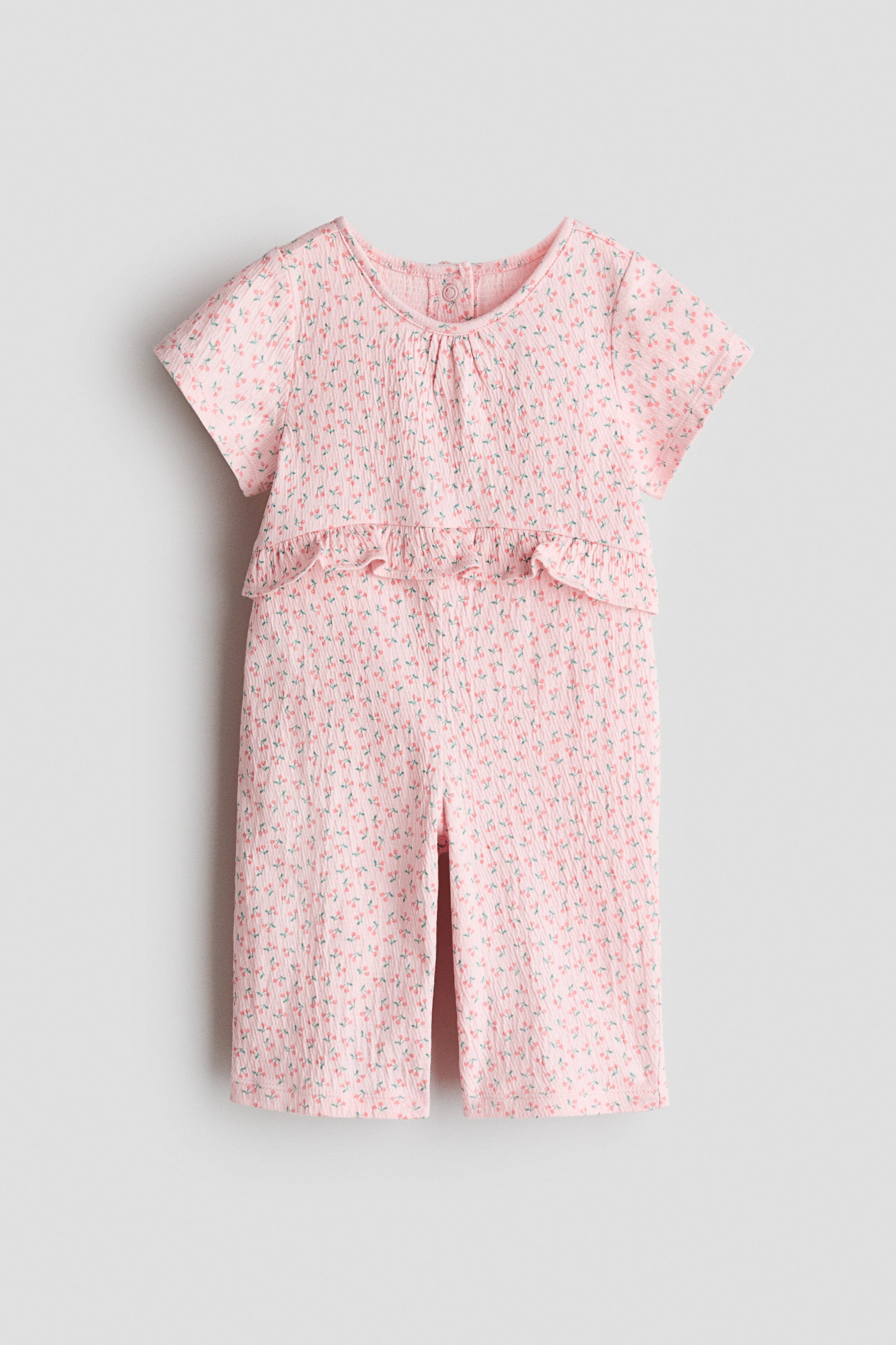 View larger image: Crinkled romper suit - Light pink/Cherries - Kids | H&M 1