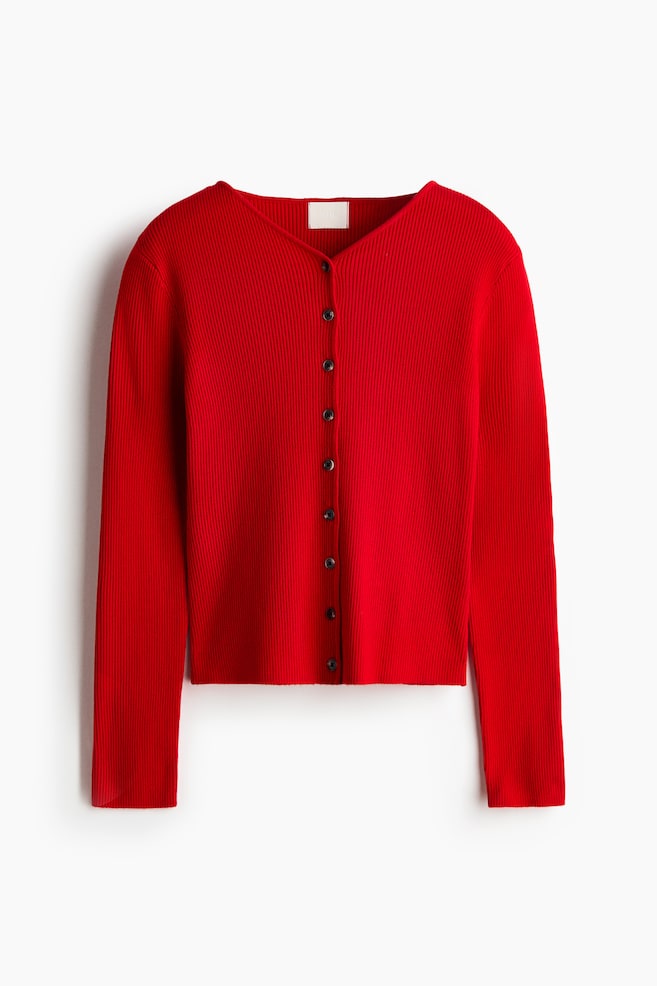 A red fitted cardigan is showcased front-facing, featuring a rib-knit texture, a V-neckline, and dark buttons running down the front. It is crafted with gently dropped shoulders, long sleeves, and a straight hem. - 1