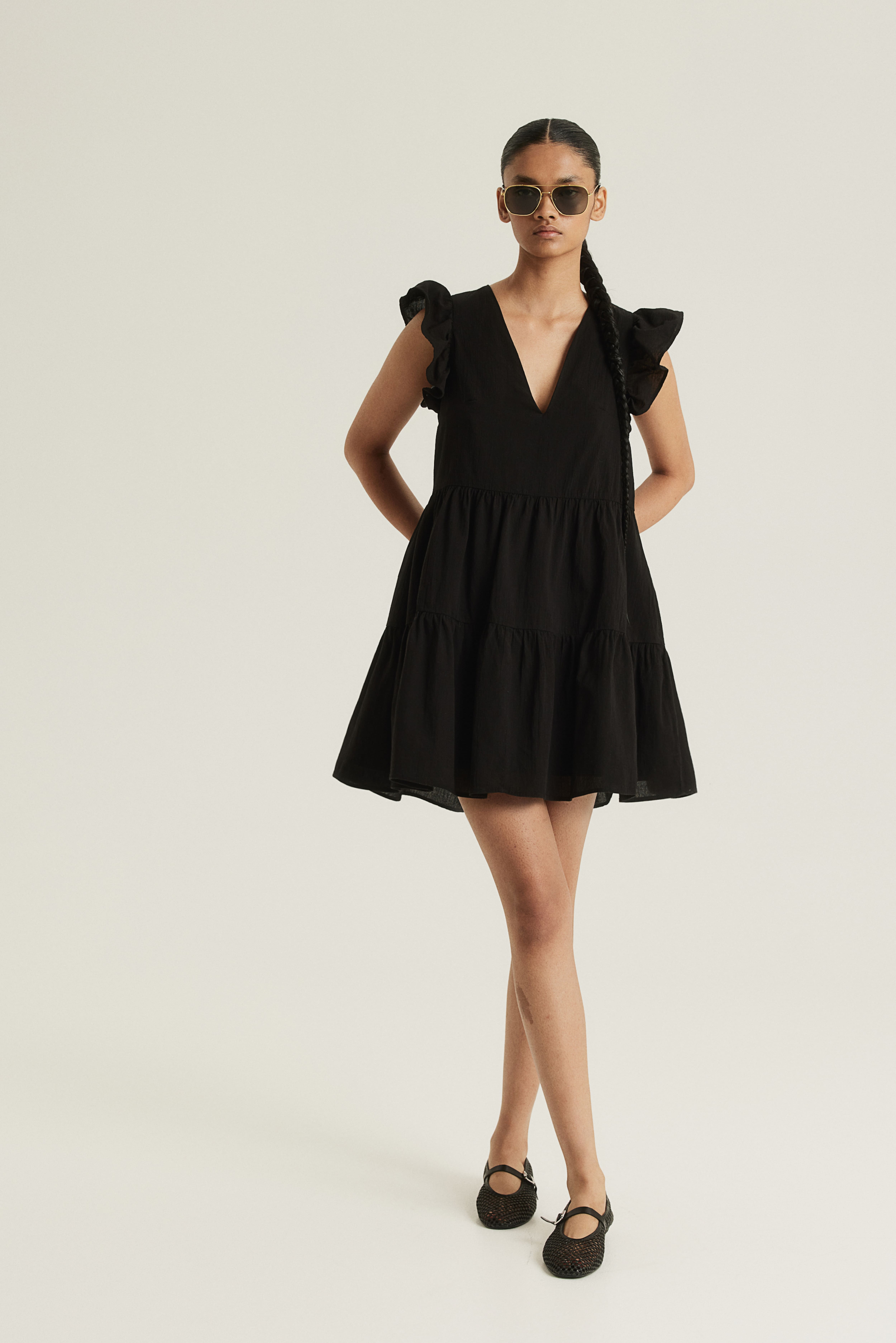 Black flutter dress best sale