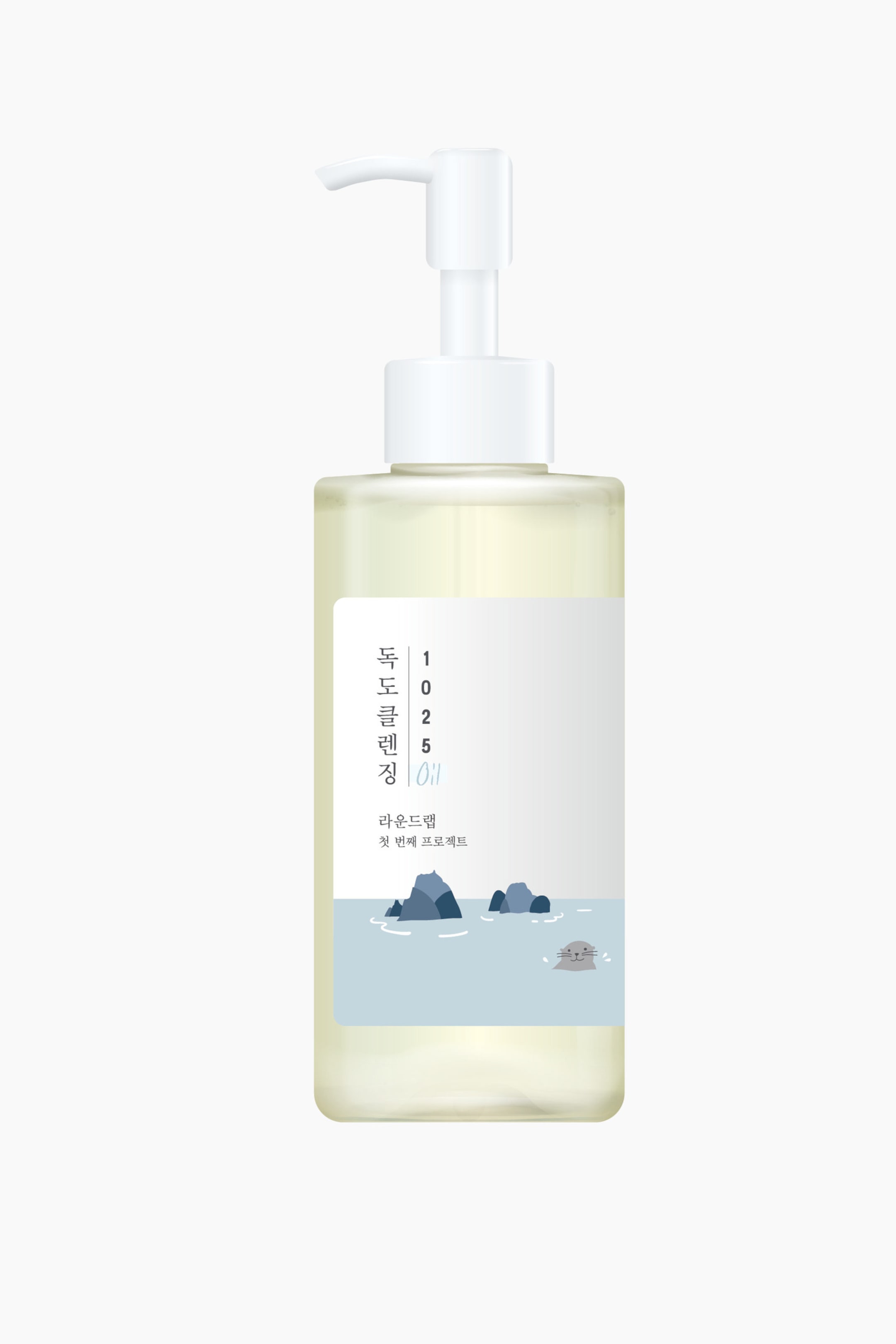 Vis større bilde: En klar, rektangulær flaske med lysegul renseolje viser forsiden sin, med en hvit pumpedispenser på toppen. En hvit etikett dekker framsiden og viser koreansk tekst, tallene "1025" og en grafikk av blå steiner i lyseblått vann med en liten grå sel.