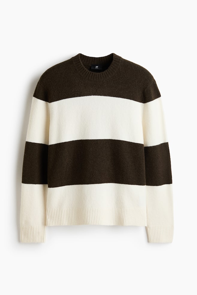 A jumper featuring a fuzzy knit texture with alternating dark brown and off-white horizontal stripes. It is designed with a crew neck, long sleeves, ribbed cuffs, and a ribbed hem. - 1