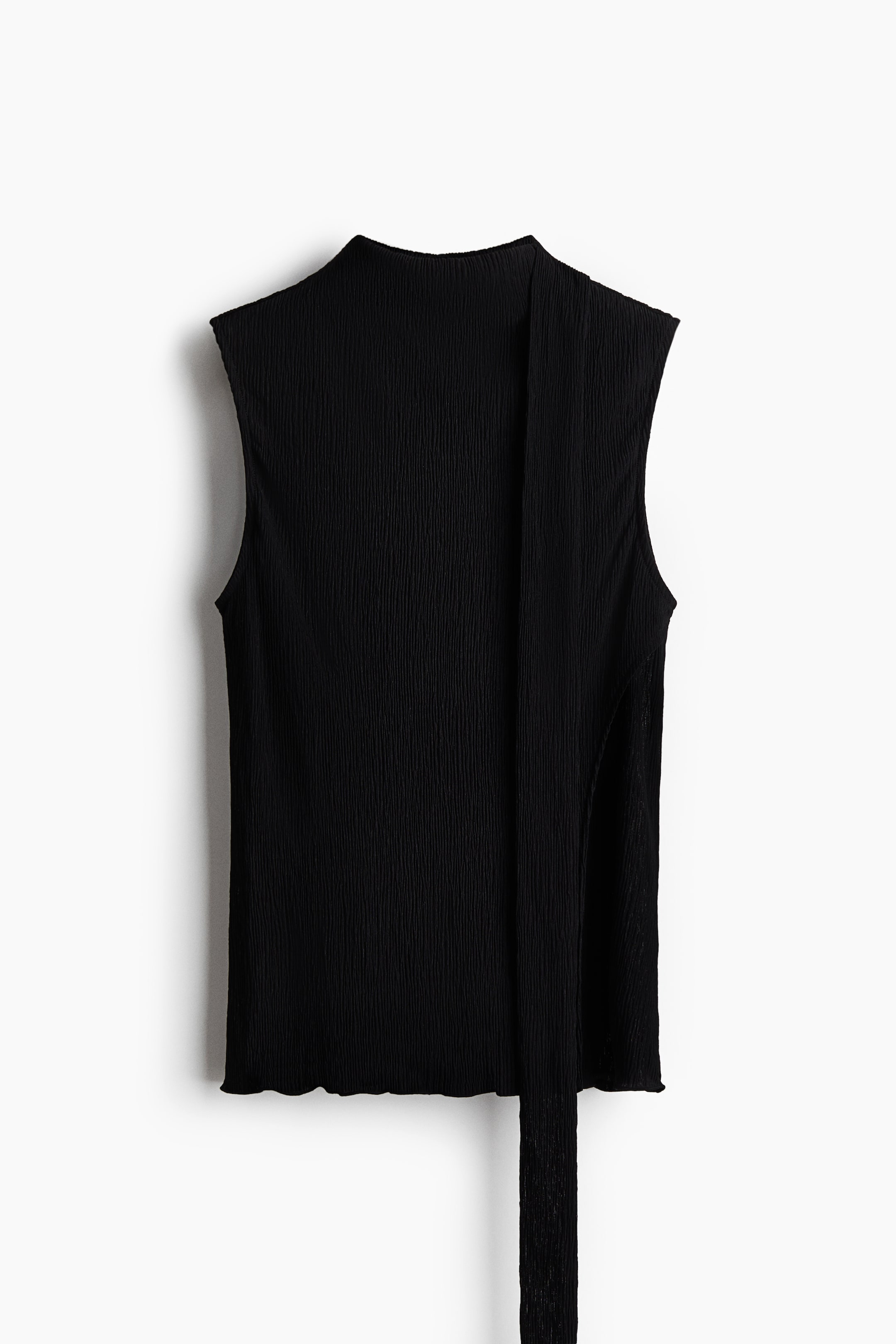 View larger image: A black sleeveless top is facing FRONT, featuring a mock neck and a crinkled texture throughout its fabric. A long, narrow tie extends down the right side from the neckline, and the bottom hem displays a wavy finish.