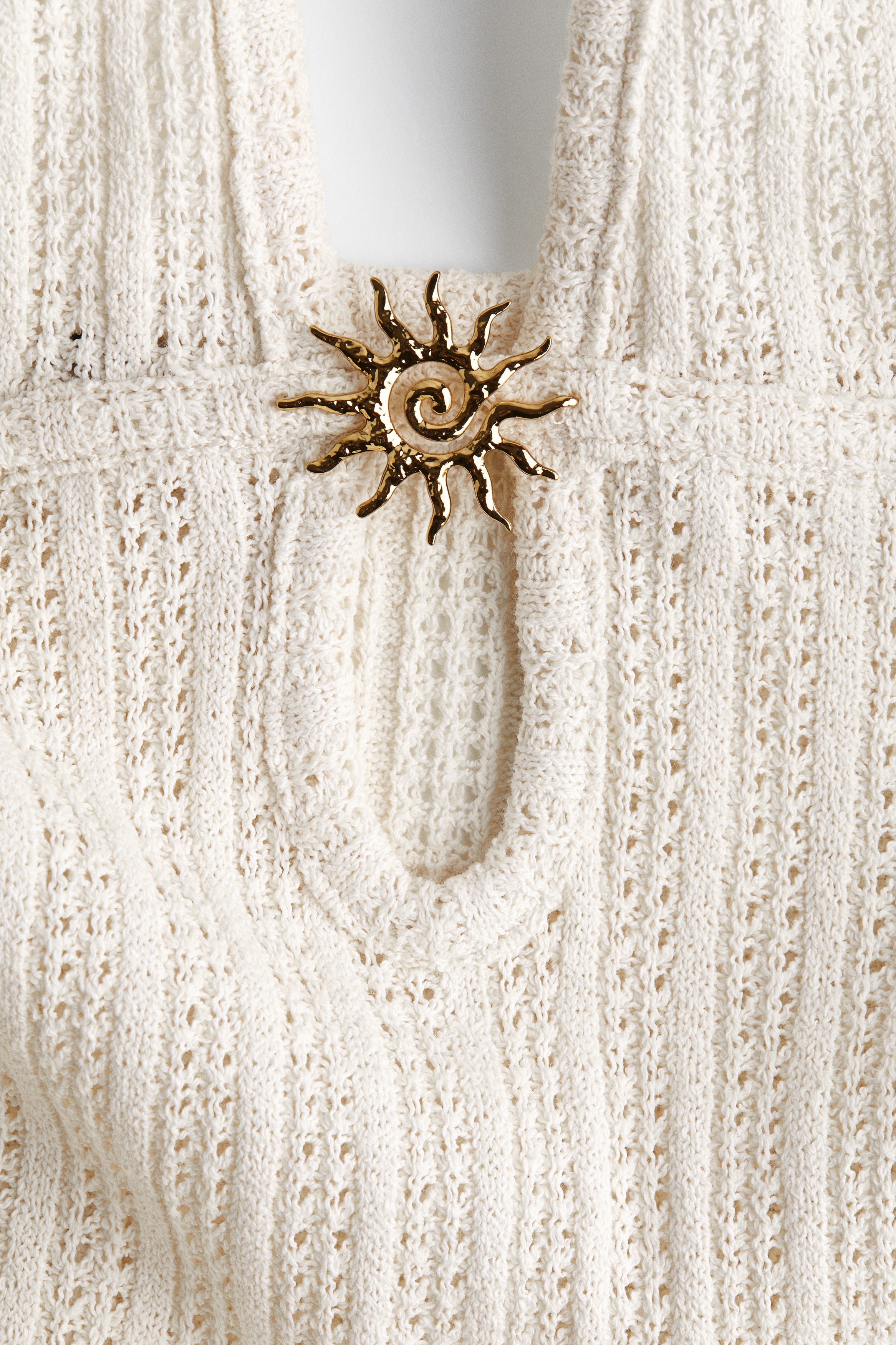 h&m cream knitted dress H&M's New Textured Knit Dress Just Won Over Our Editors