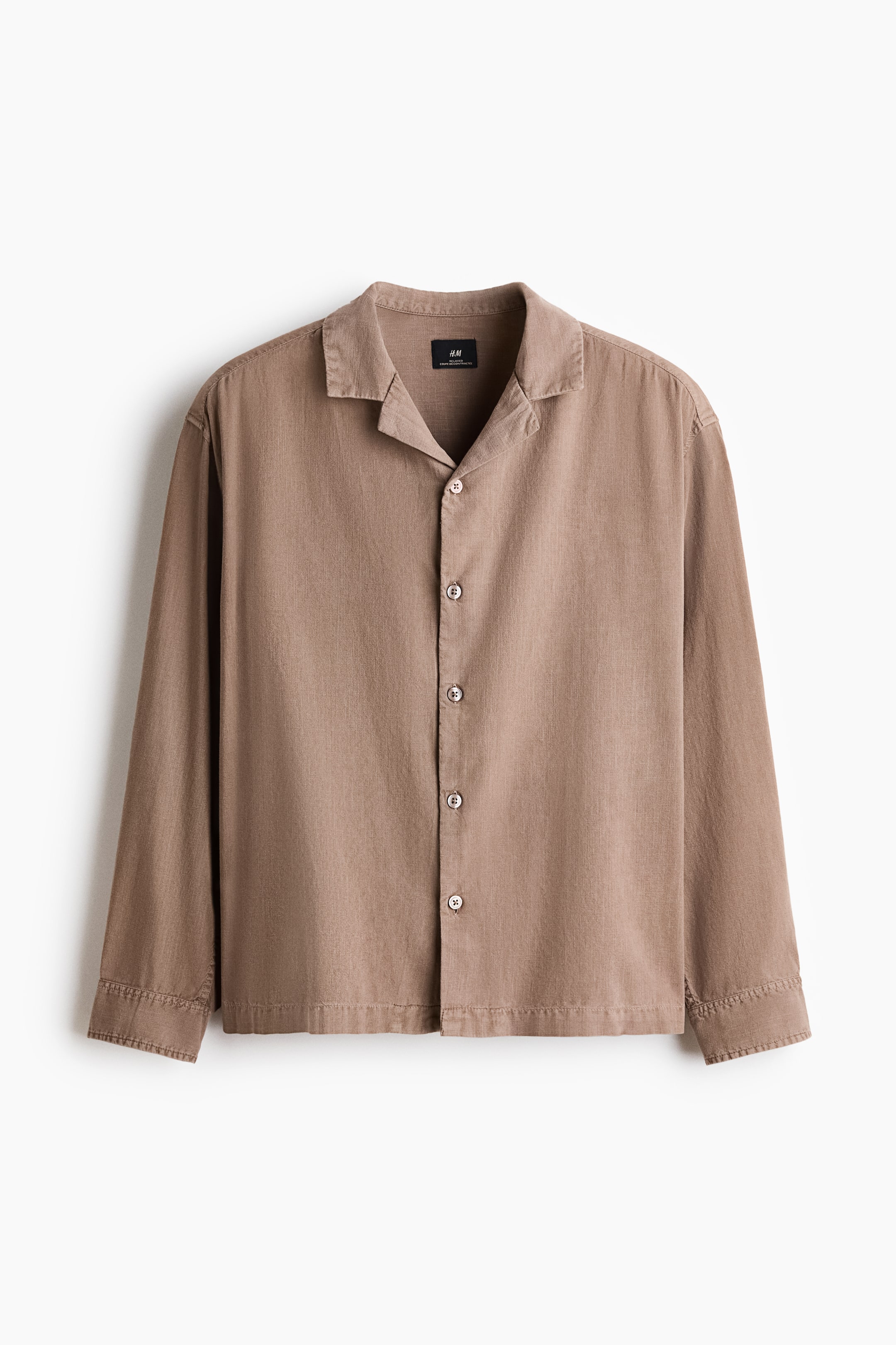 View larger image: A brown long-sleeved shirt is shown from the front, featuring a camp collar, a full button-front placket with light-coloured buttons, and simple cuffs, all in a visible textured weave.