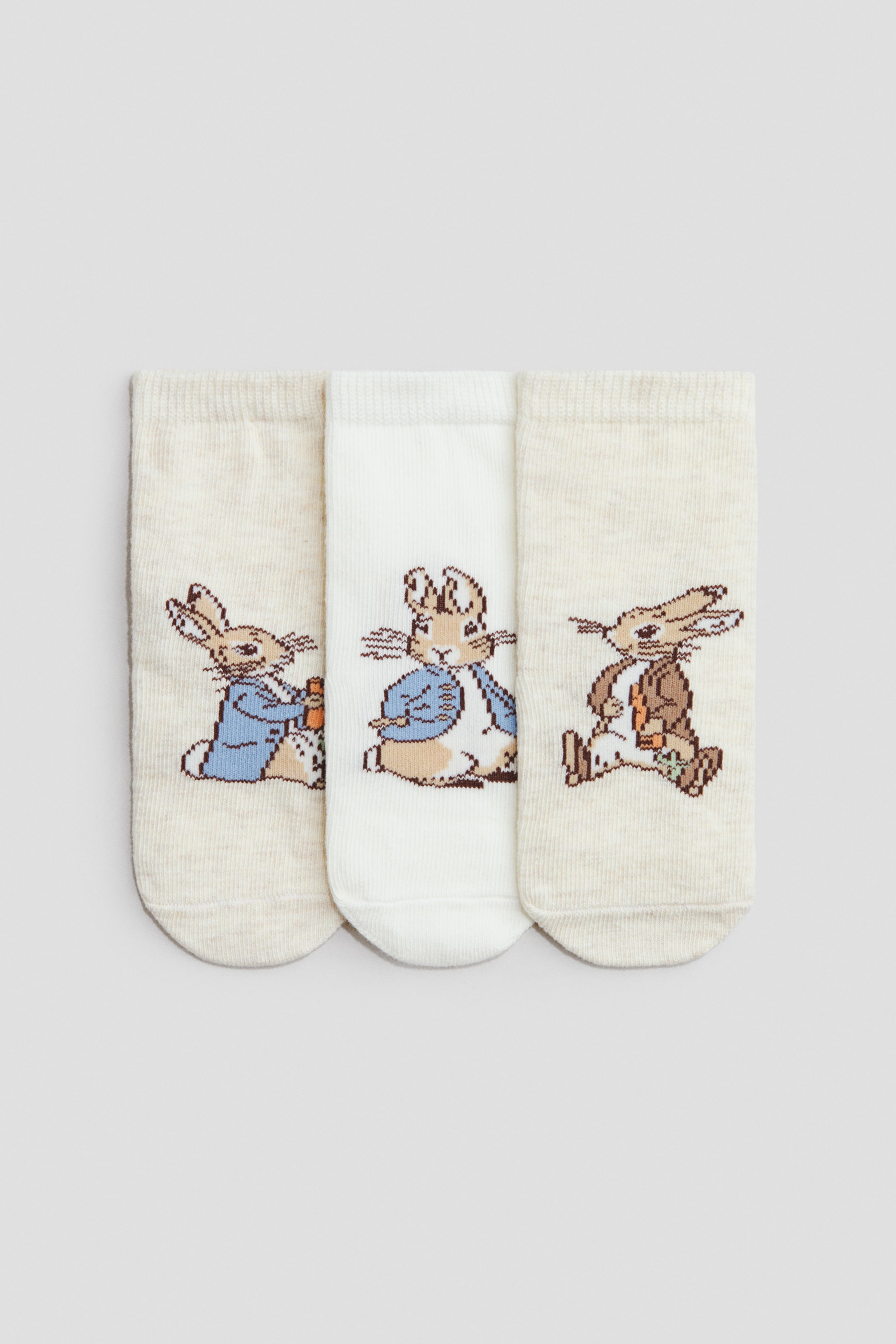 Ampliar la imagen: 3-pack de calcetines con diseño - Beige/Peter Rabbit - Kids | H&M MX 1