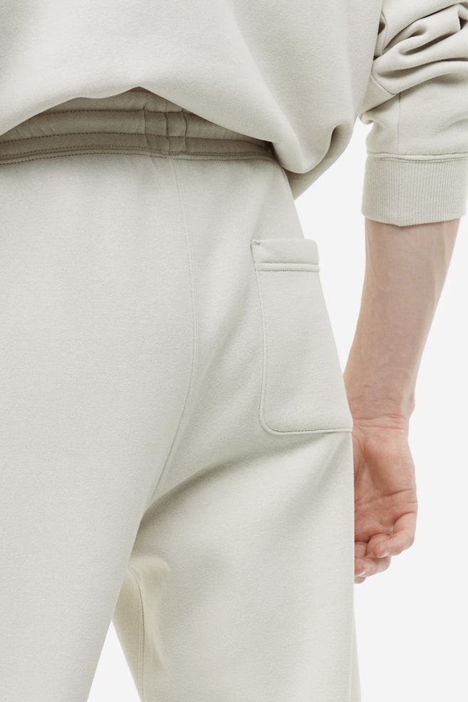 Pantaloni in felpa Relaxed Fit - Greige chiaro/Nero/Grigio mélange/Blu navy/dc - 3